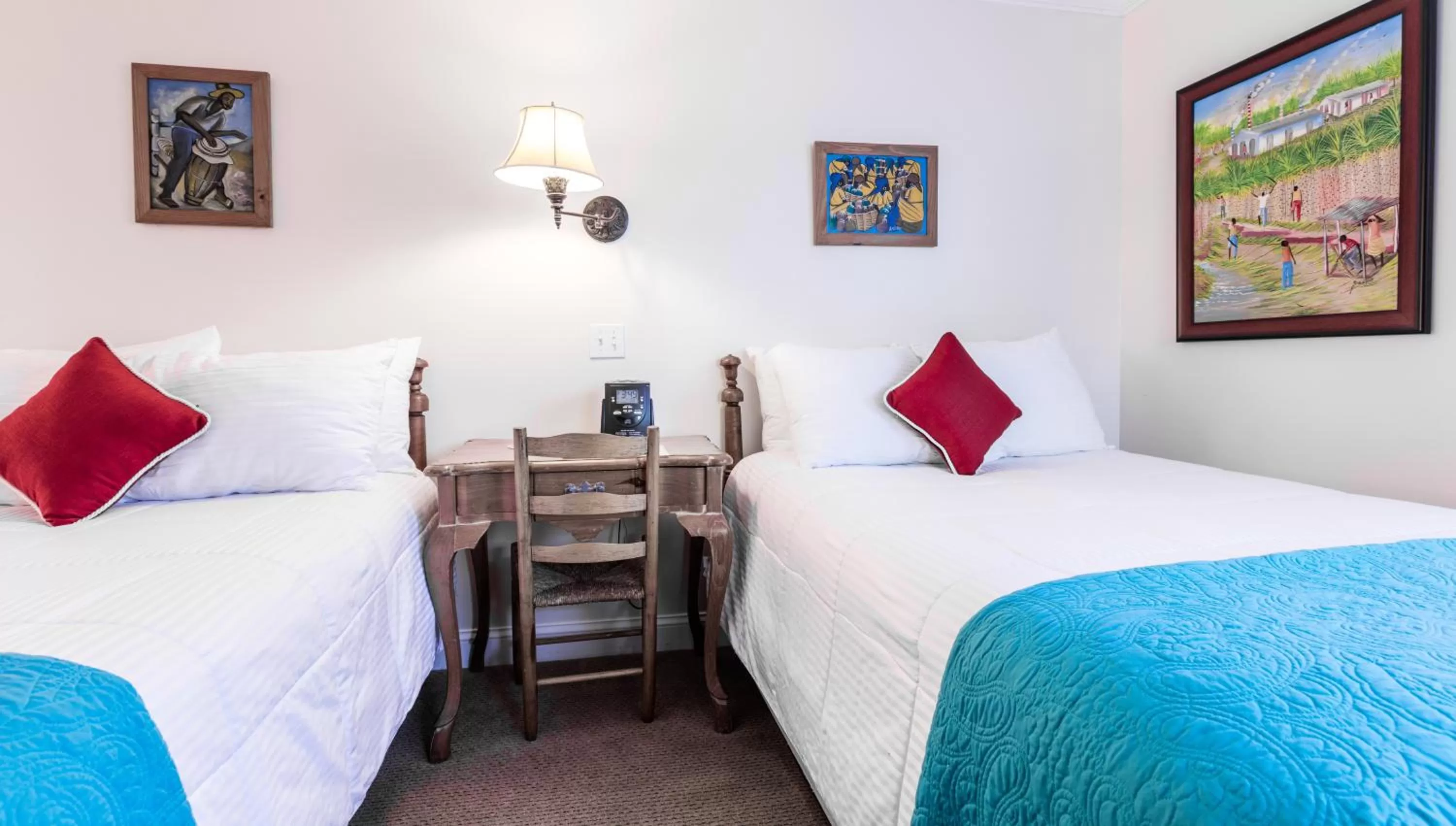 Bedroom, Bed in The Caribbean Court Boutique Hotel