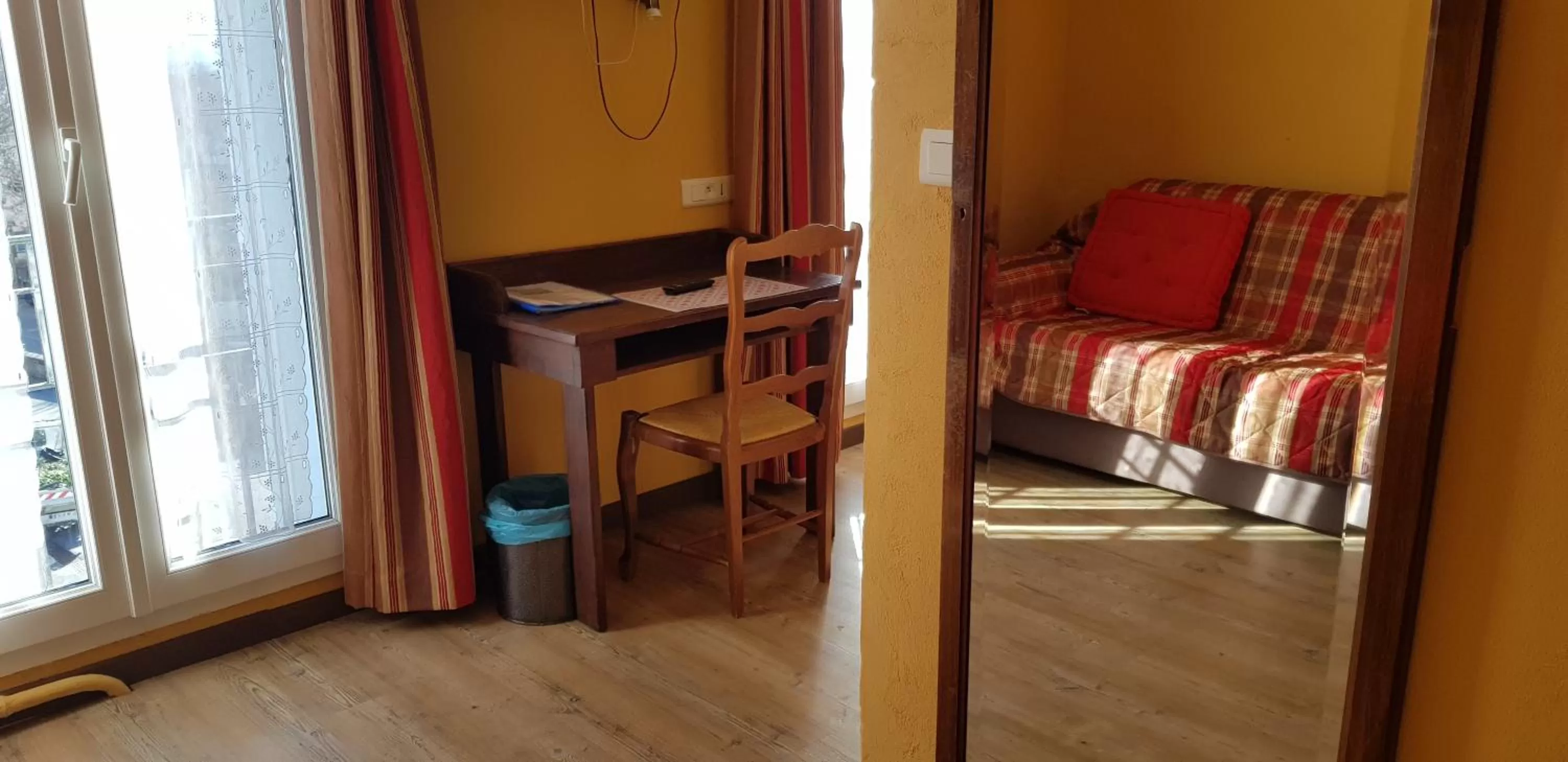 Seating area, Bed in Logis hôtel du terreau
