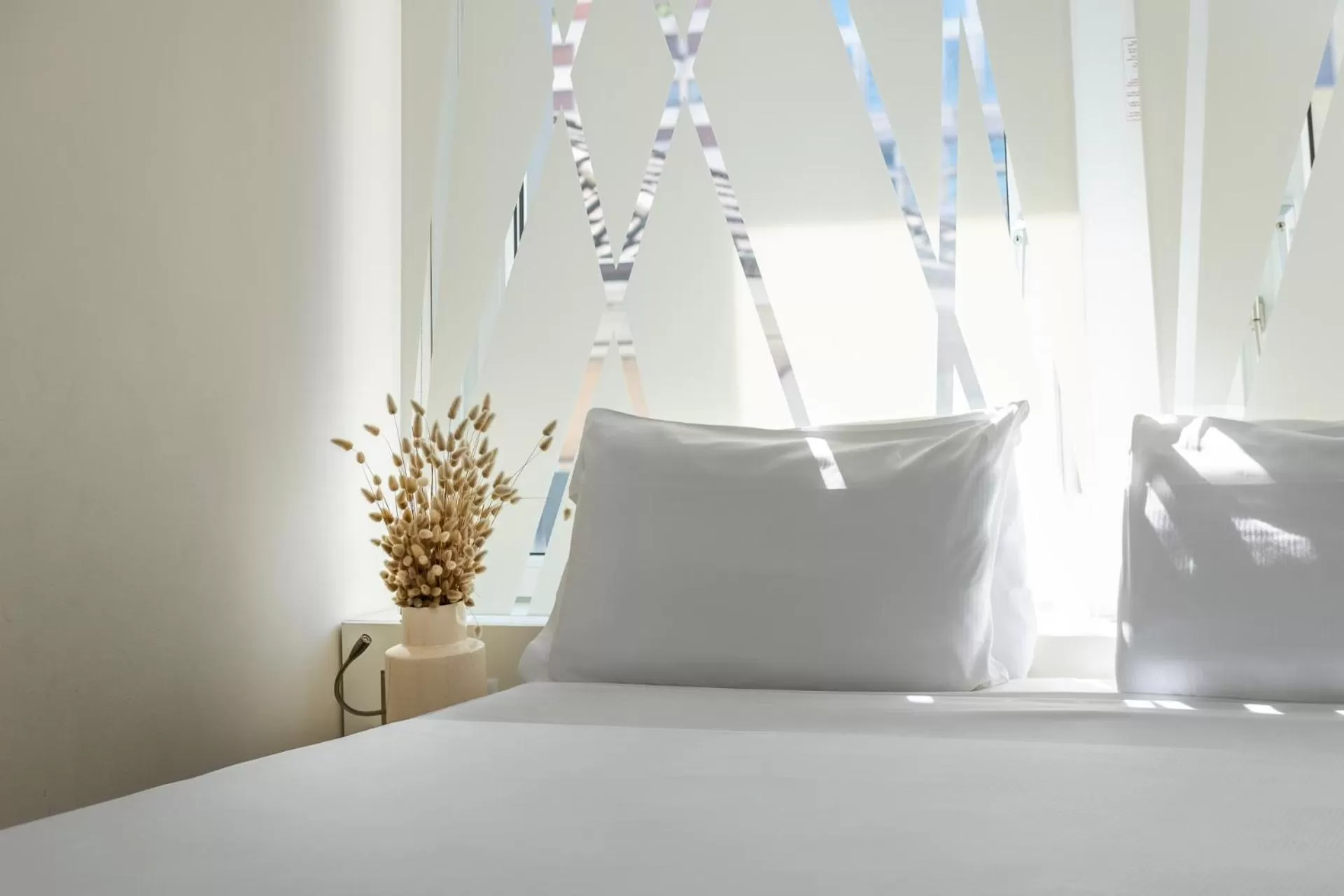 Bed in Hotel Admiral Lugano