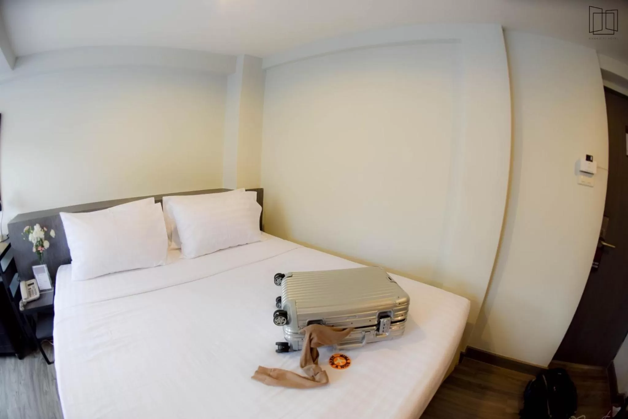 Bed in Nana City Hotel