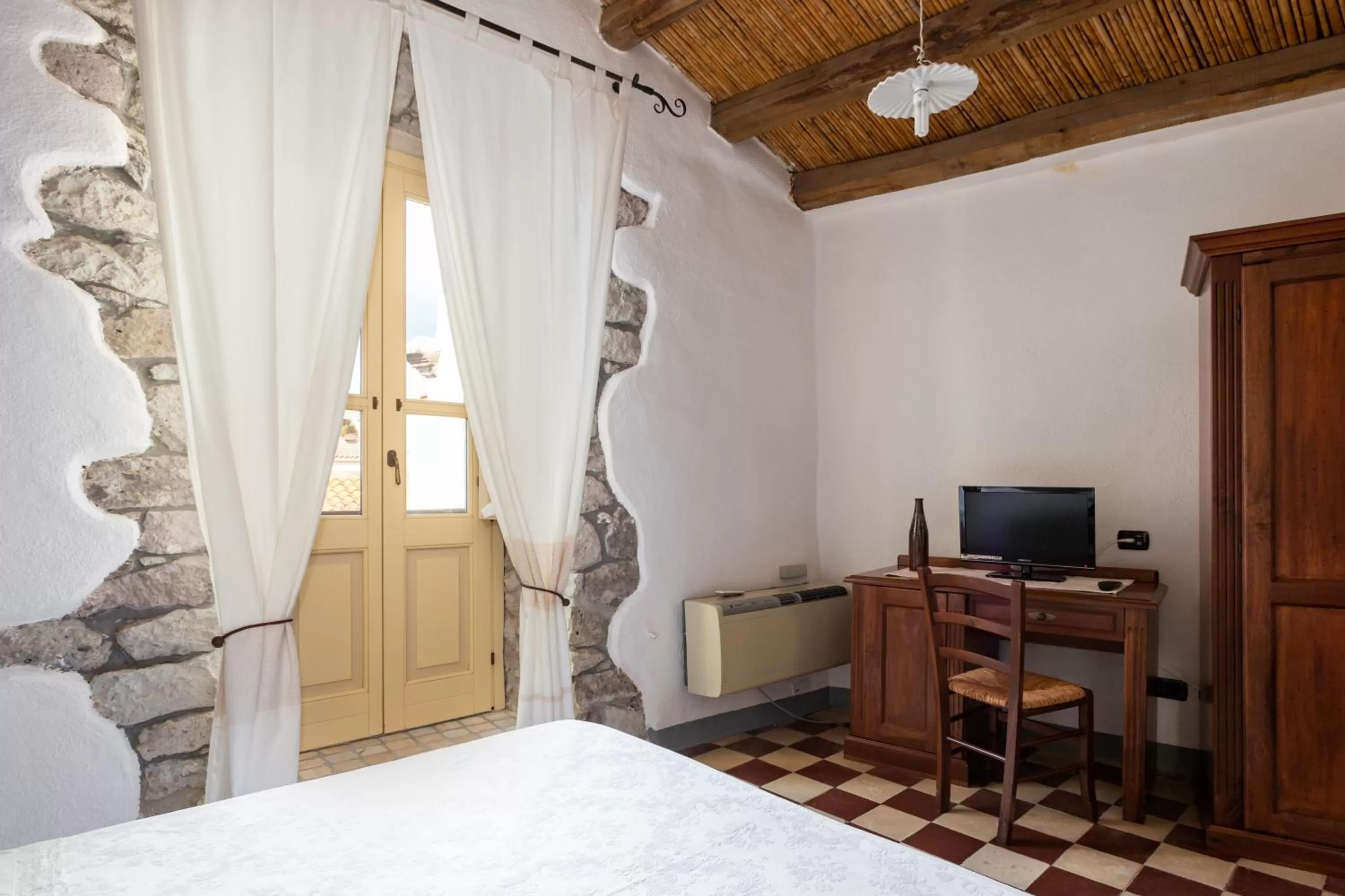 Decorative detail, Bed in Locanda di Corte
