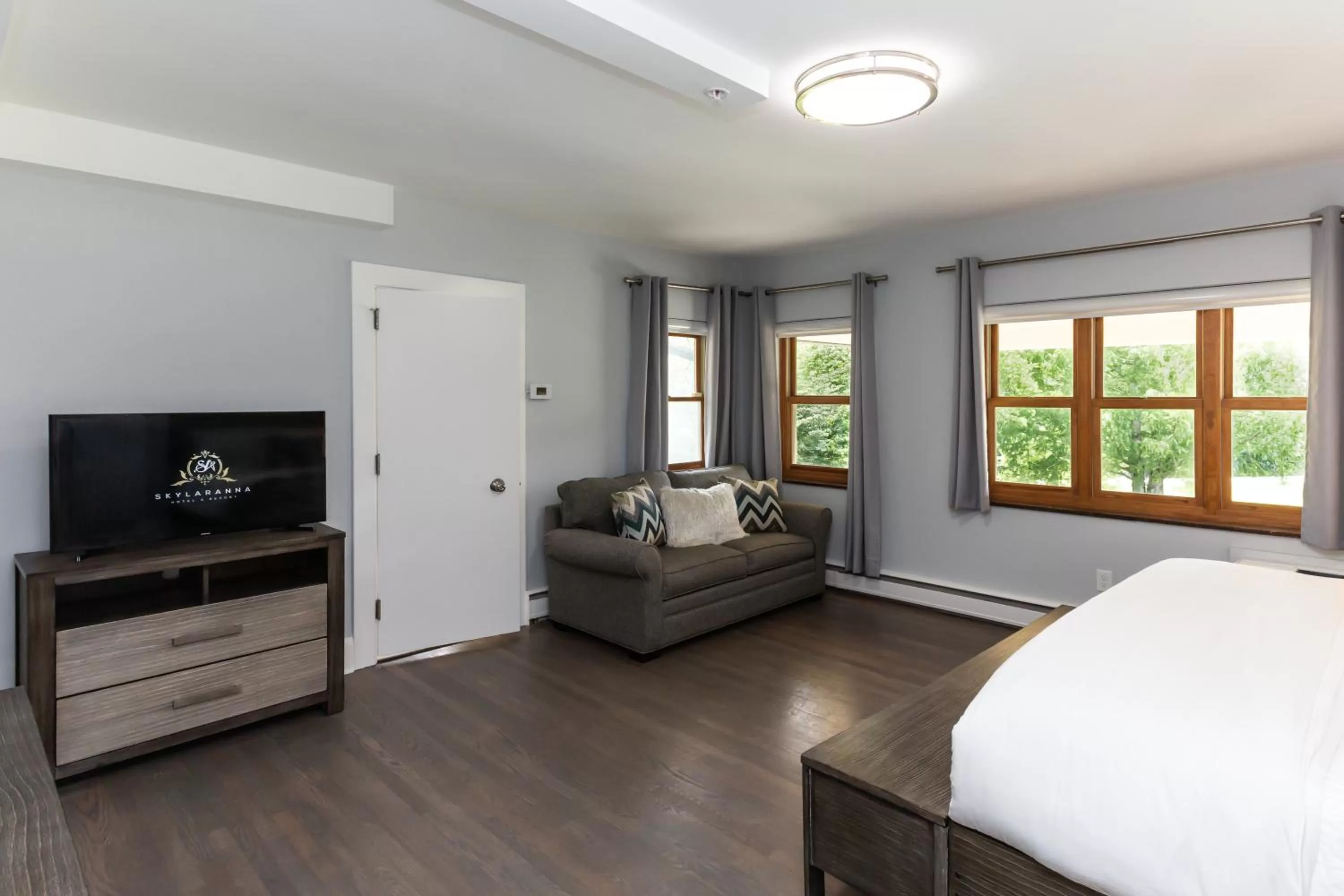 Bed in SKYLARANNA Resort & SPA