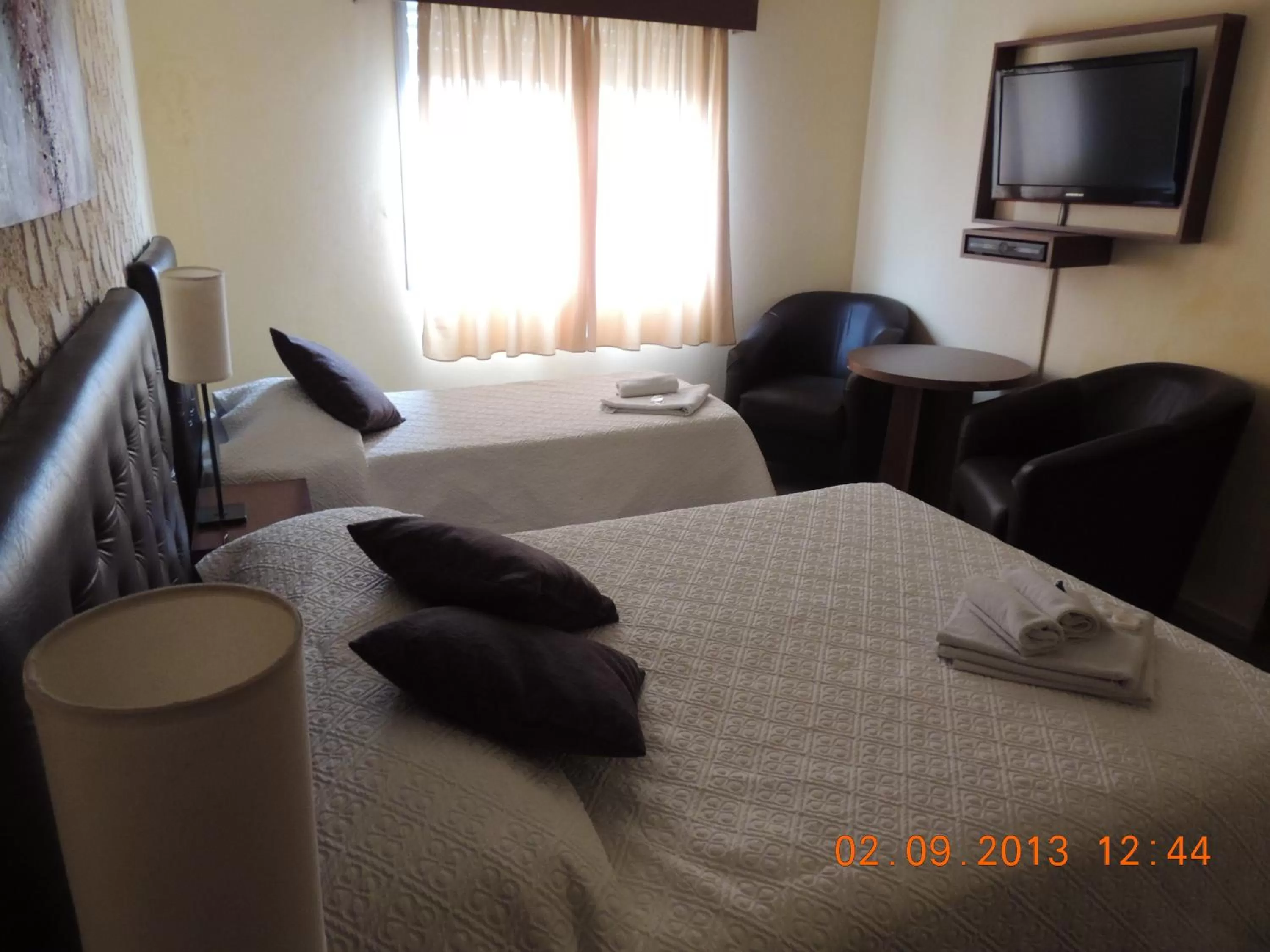 Day, Bed in Hotel Internacional