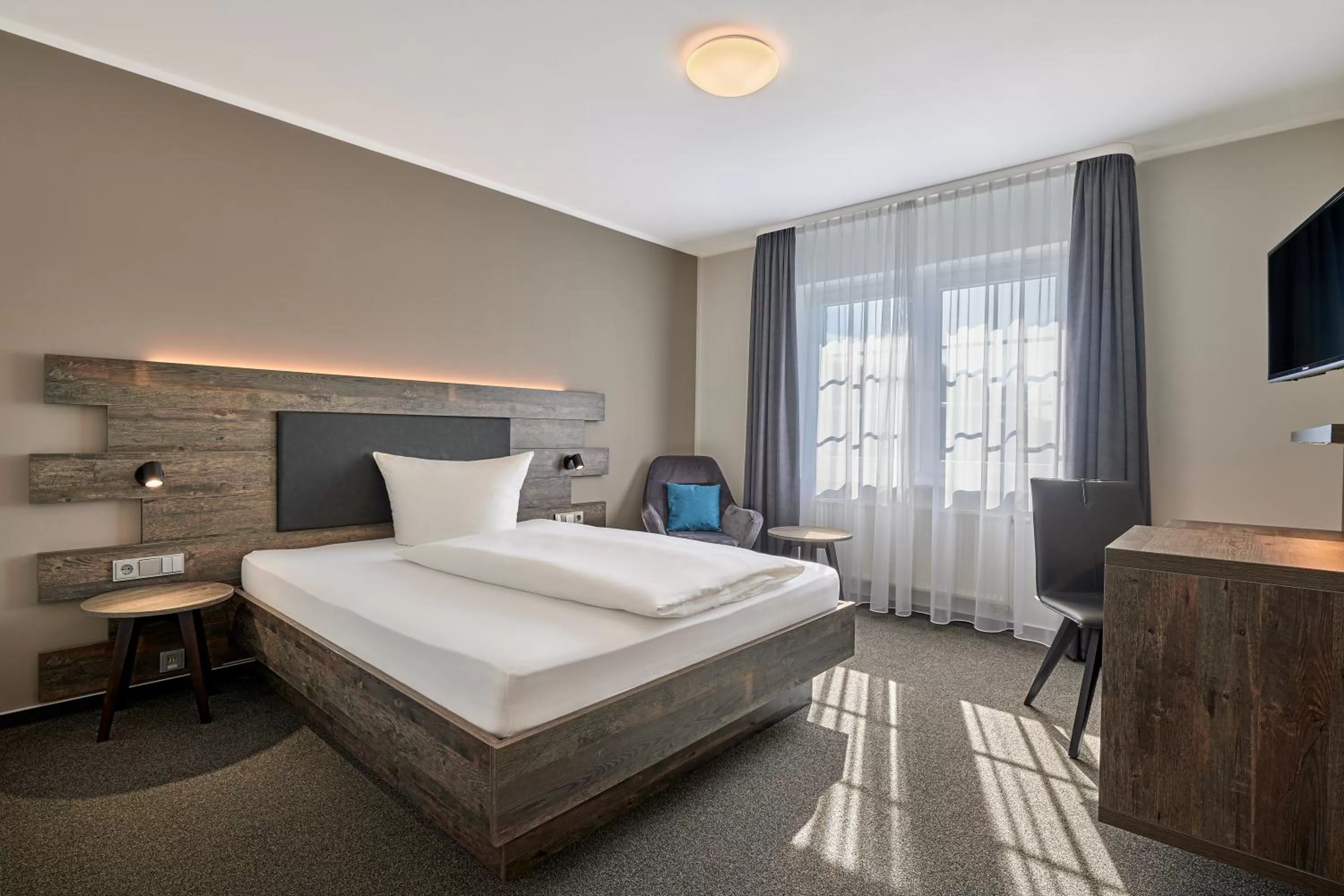 Photo of the whole room, Bed in Hotel Pfeffermühle