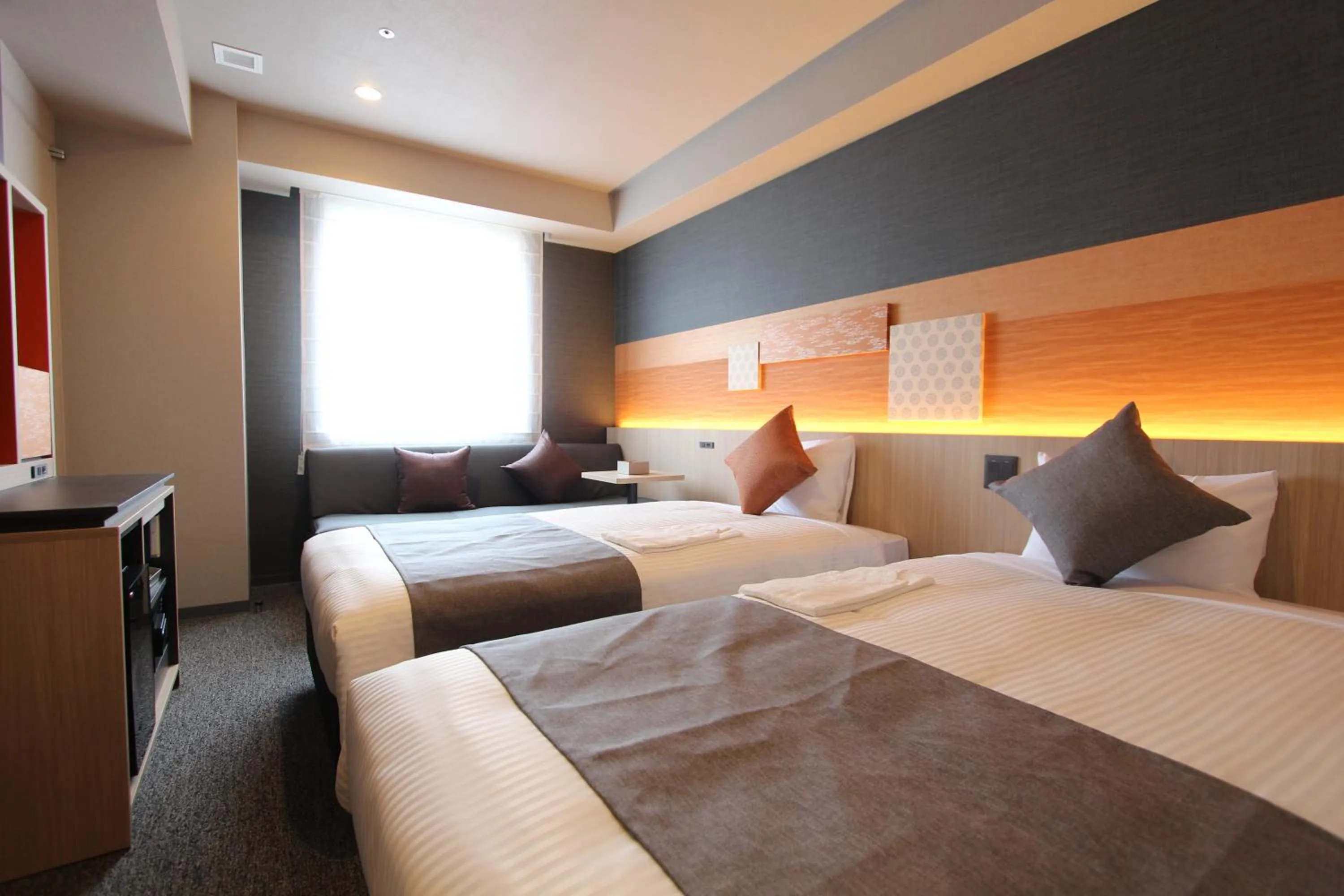 Bed in KOKO HOTEL Tsukiji Ginza