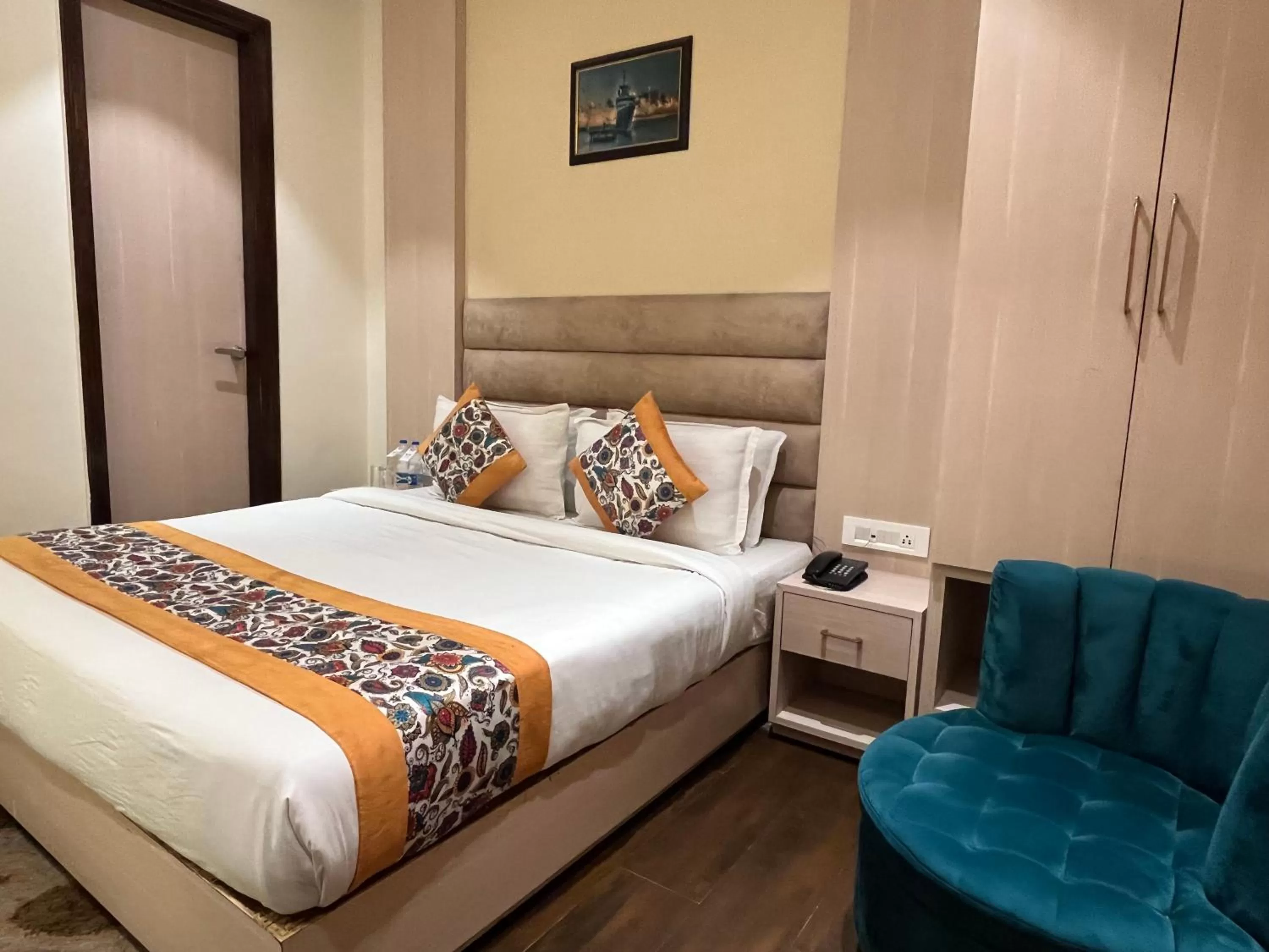 Photo of the whole room, Bed in RRV Hotel