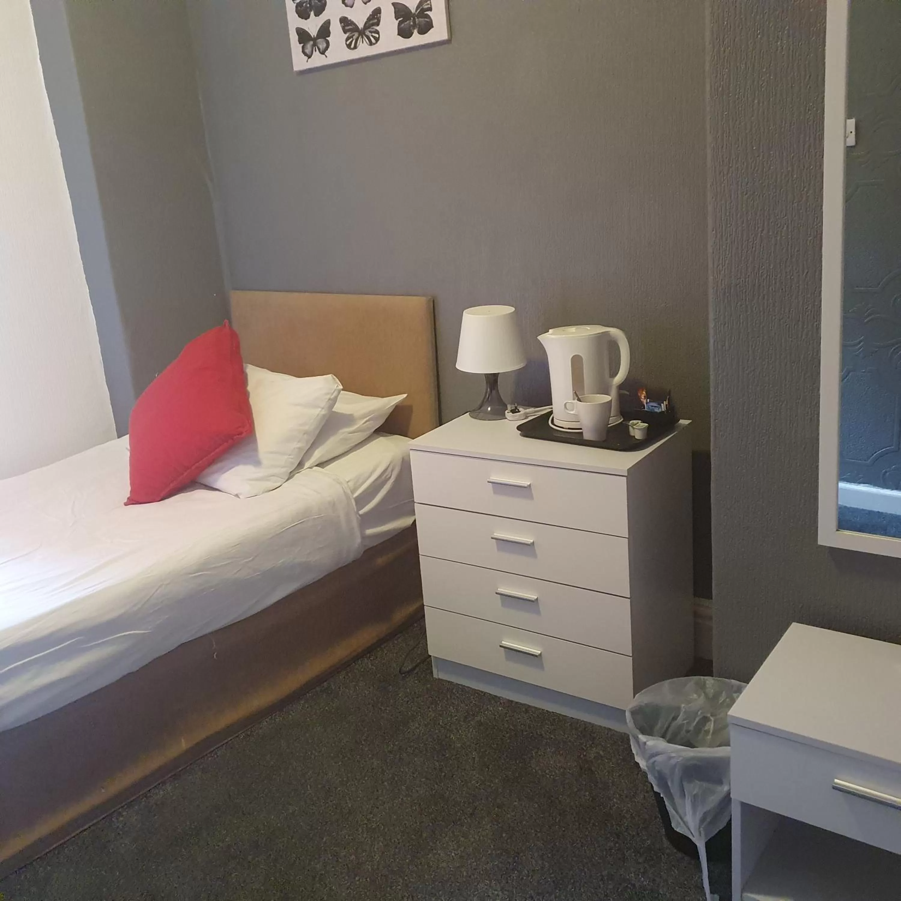 Bed in Palm Beach Hotel by the Sea