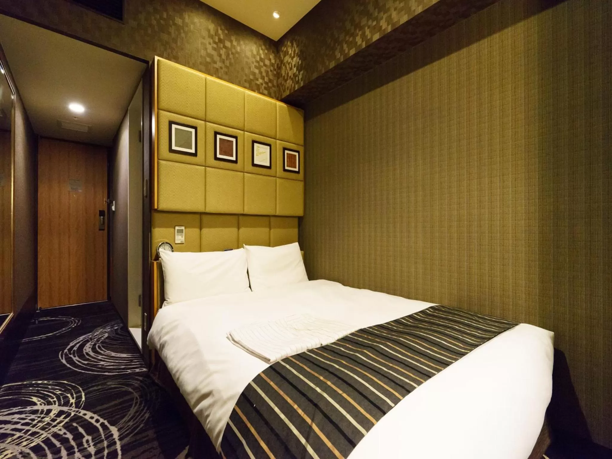 Bed in Sotetsu Fresa Inn Higashi Shinjuku