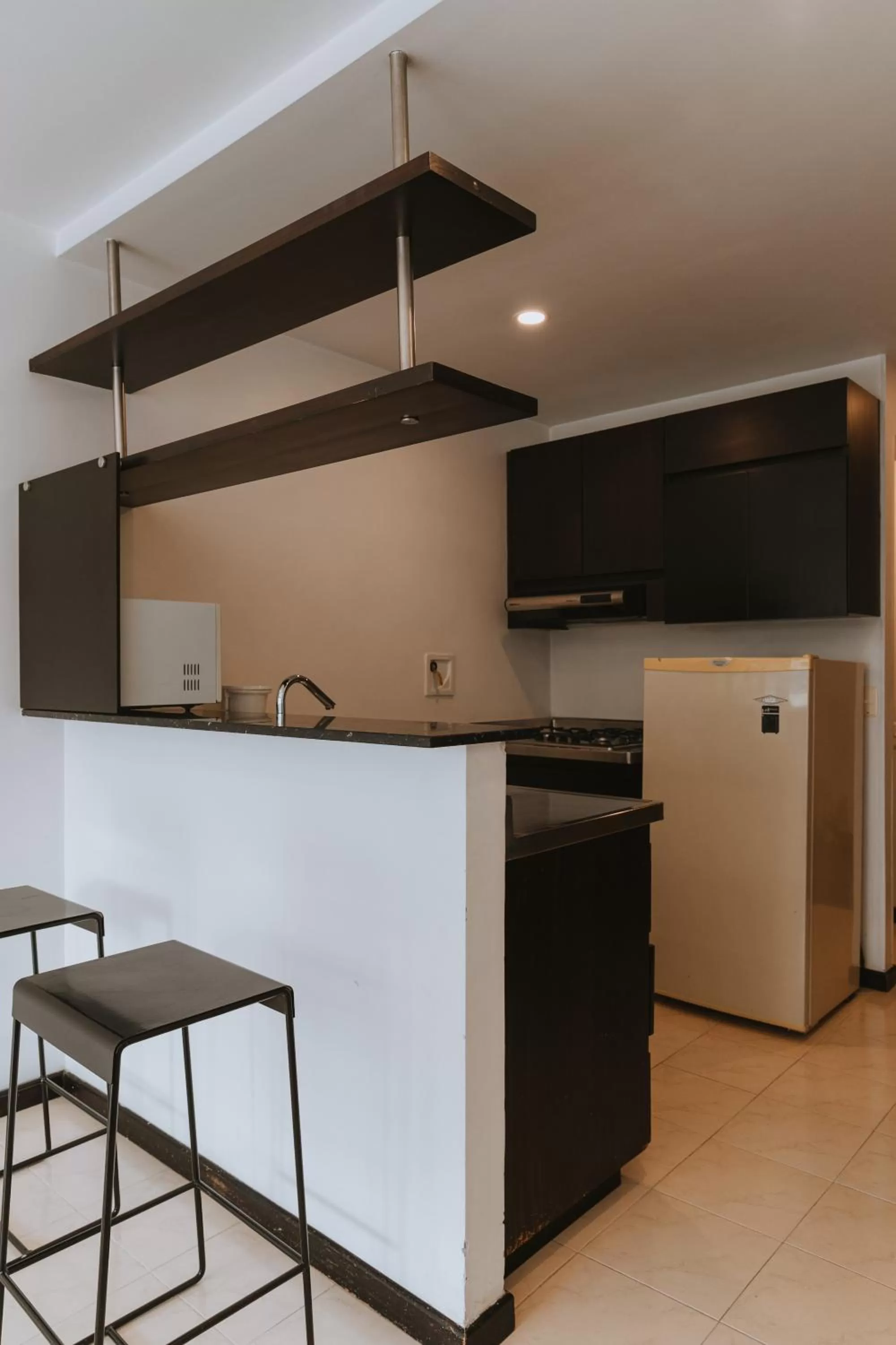 kitchen in Travelers Orange Suites