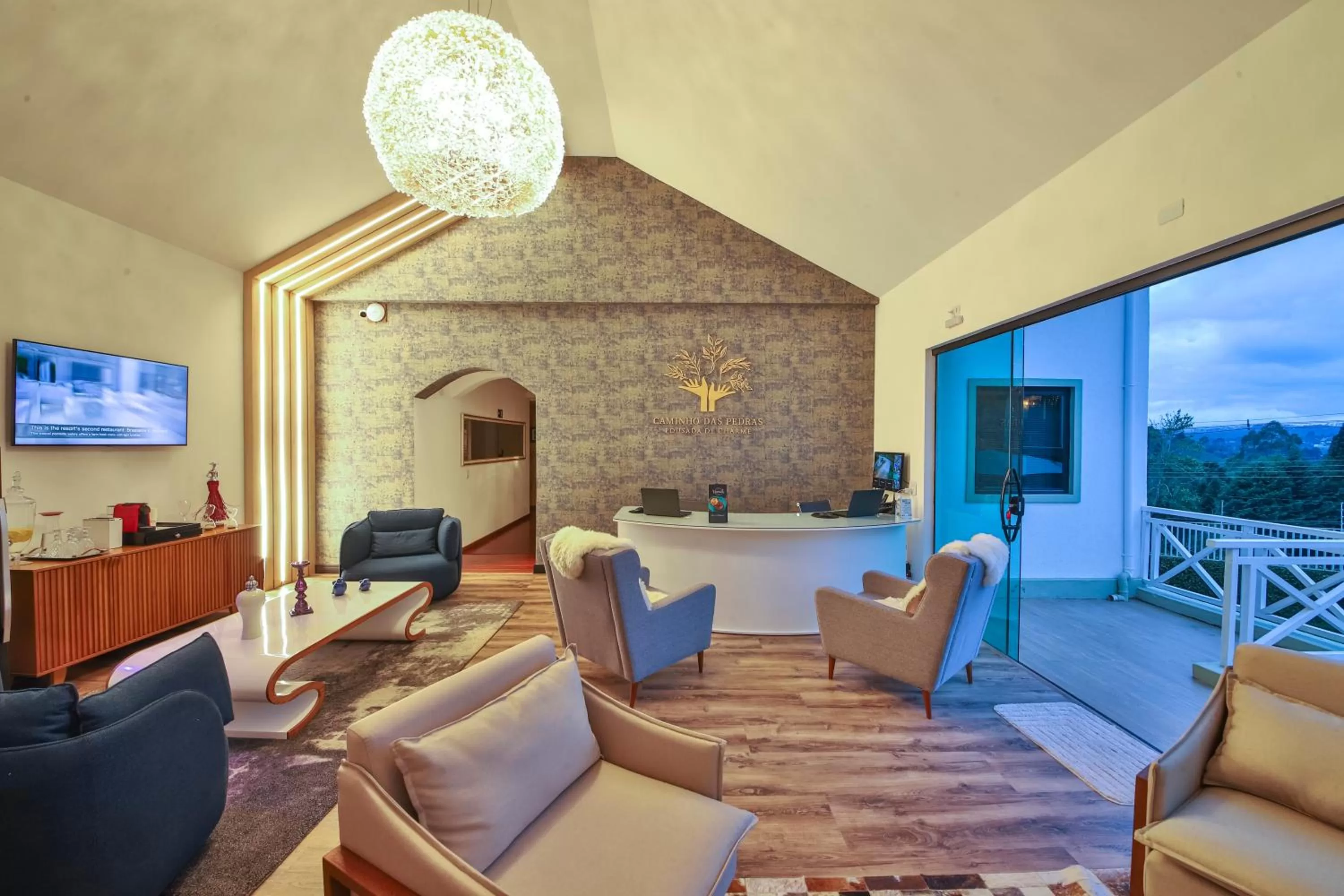 Communal lounge/ TV room in Caminho das Pedras Pousada de Charme