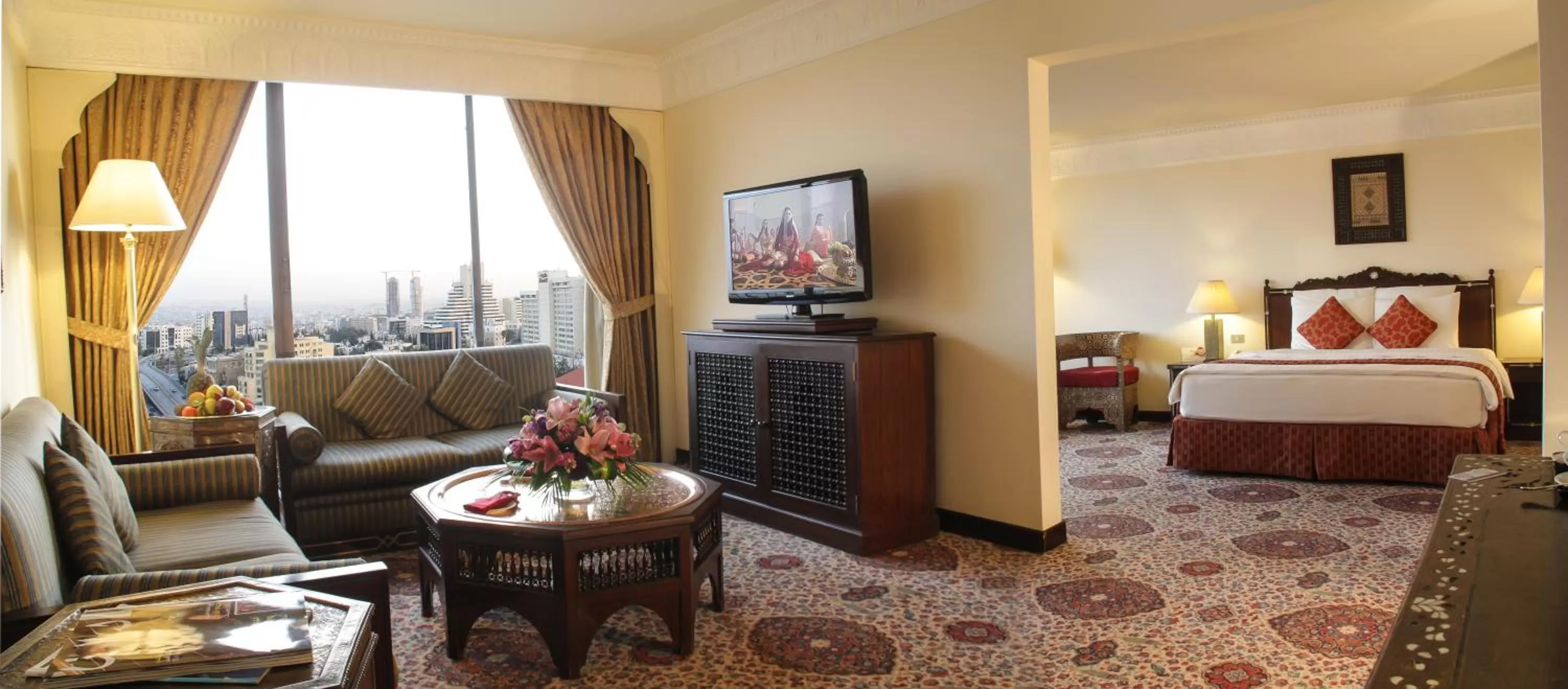 Communal lounge/ TV room, Bed in Regency Palace Amman