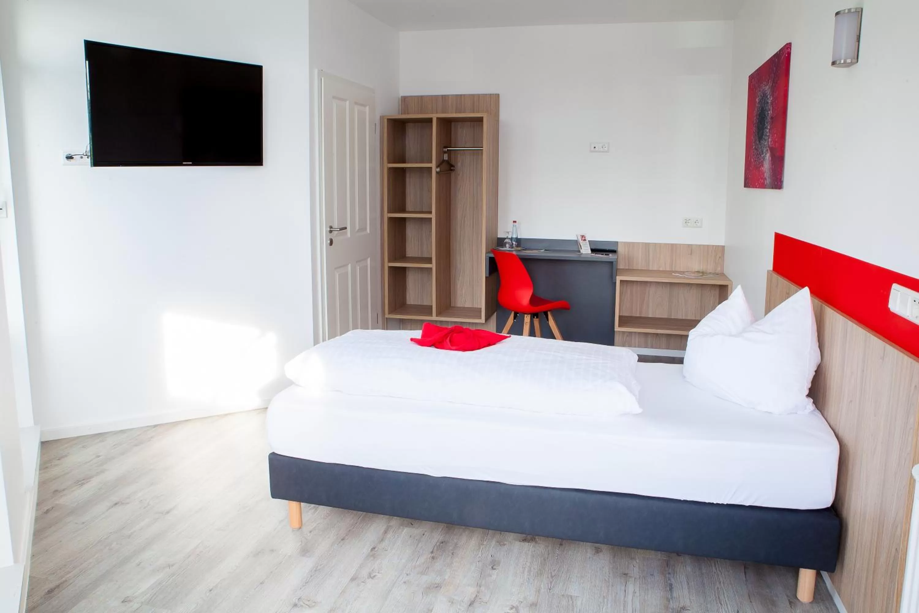 Photo of the whole room, Bed in Hotel Hohenloher Tor