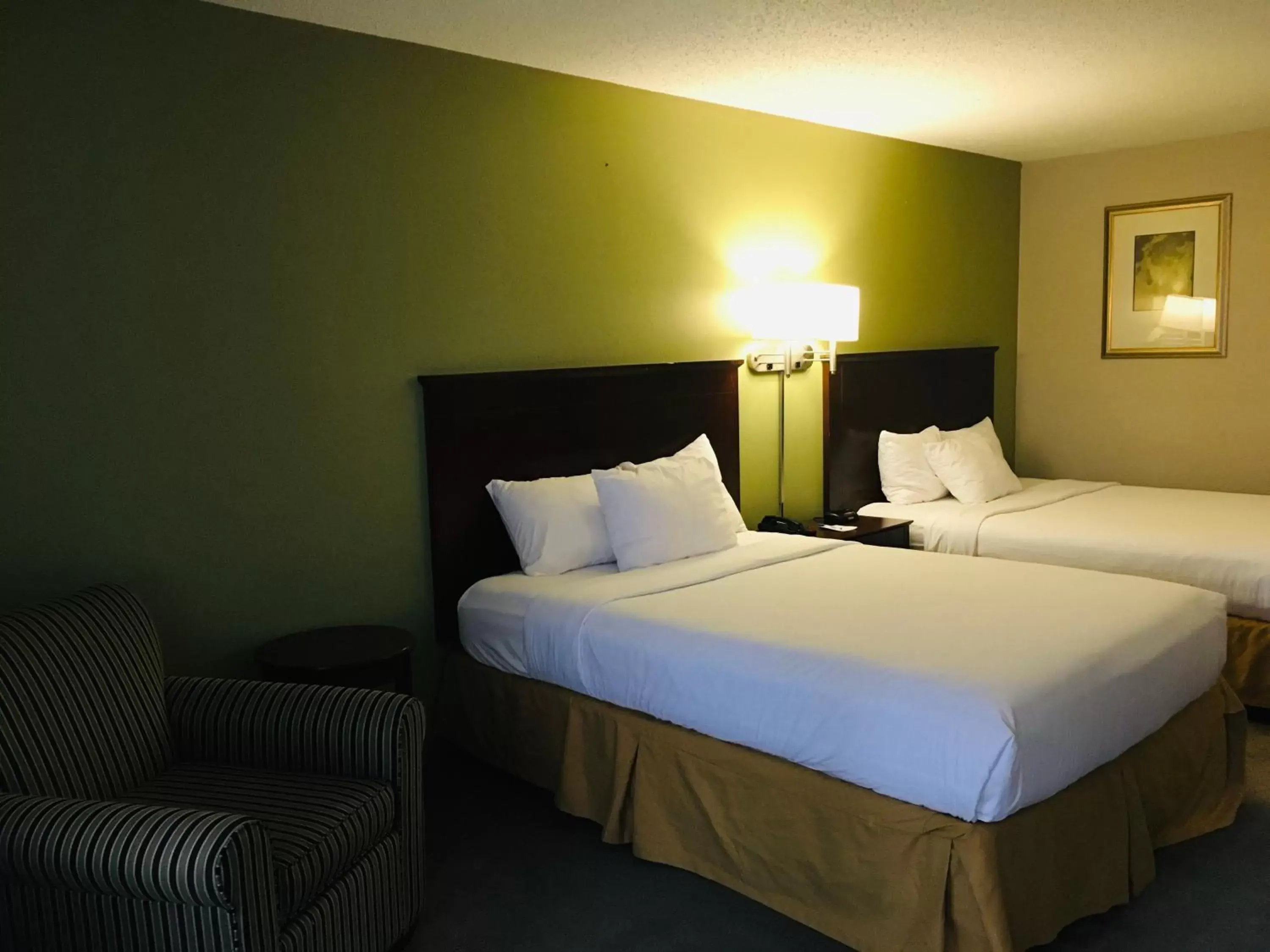 Bed in Ramada by Wyndham Batesville Bed in Ramada by Wyndham Batesville