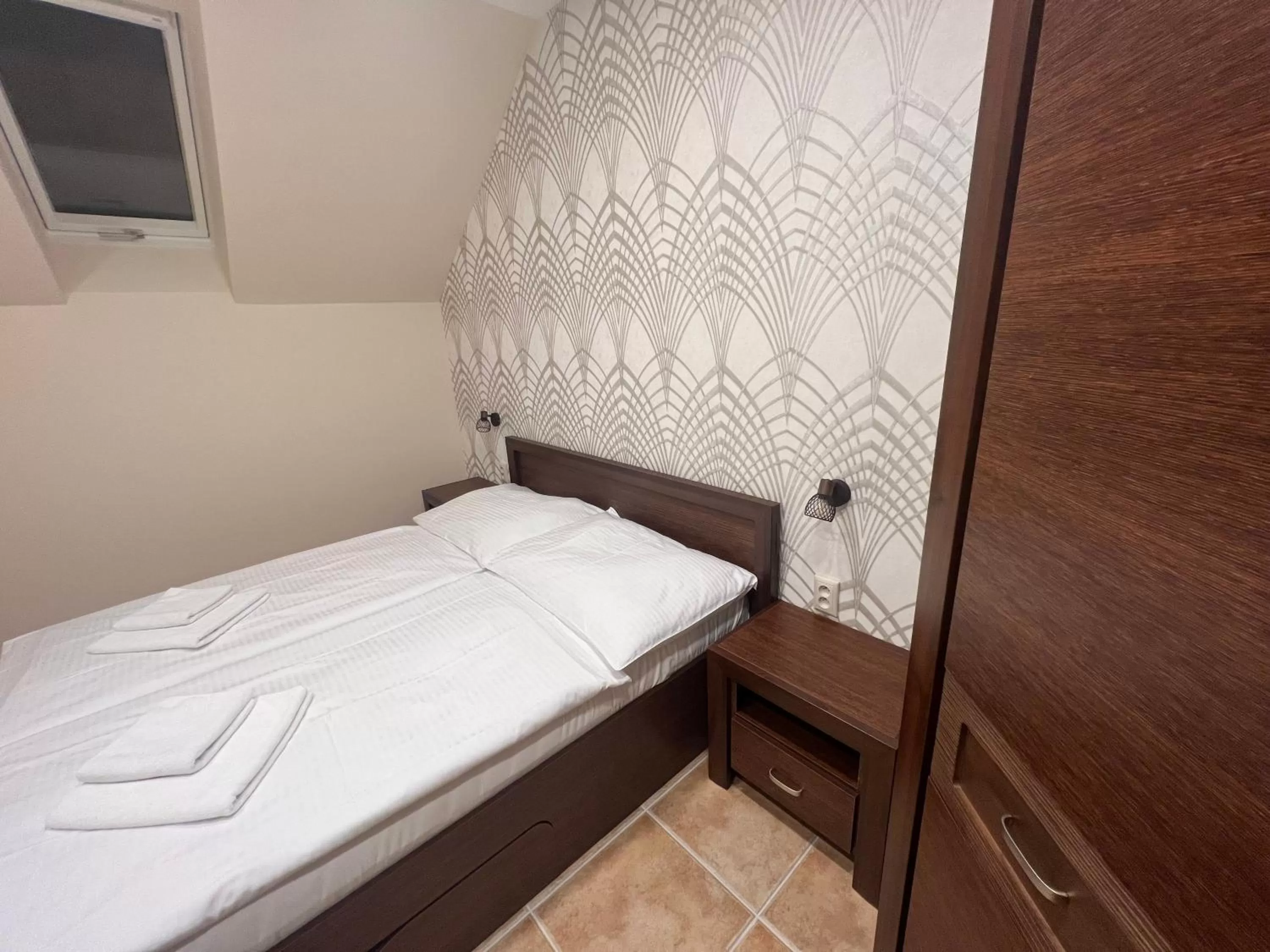 Bed in Spa & Wellness Hotel Orchidea