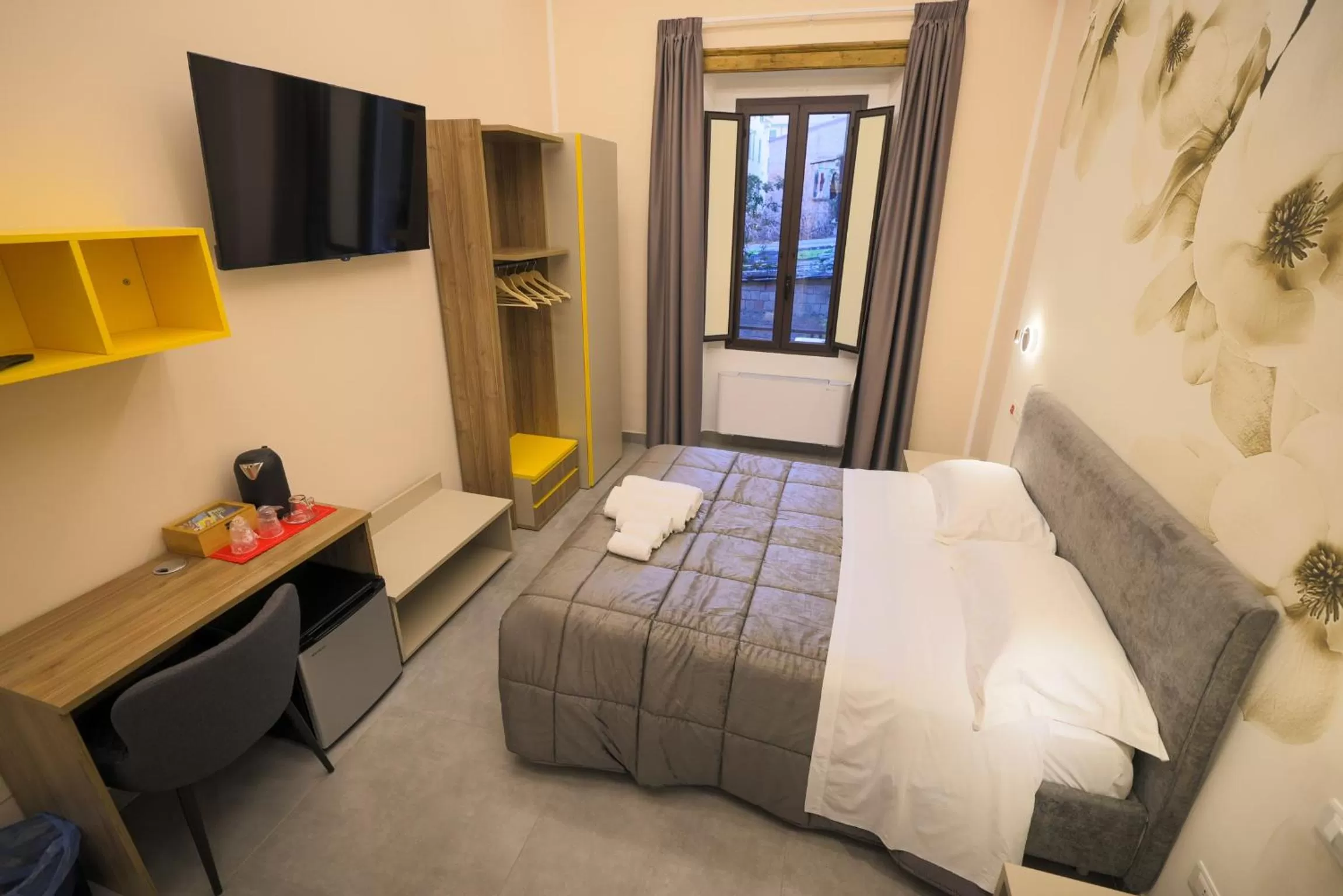 Bed in Brettia Guest Rooms