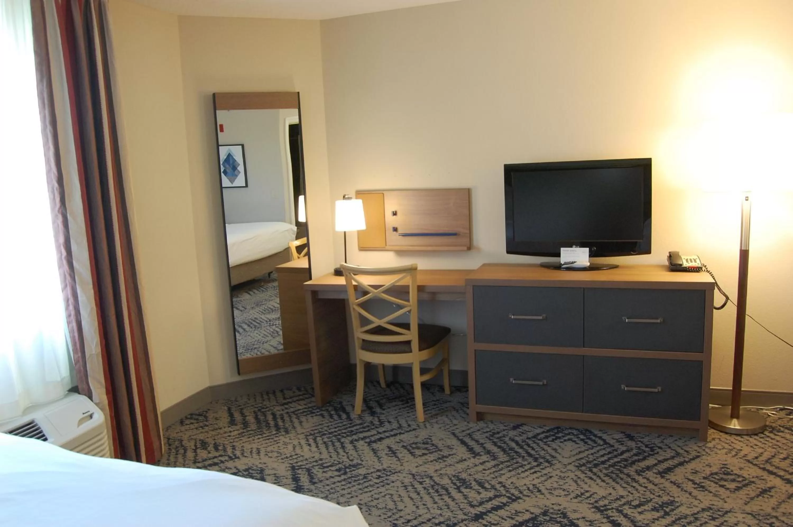 Photo of the whole room, Bed in Candlewood Suites Harrisburg I-81 Hershey Area by IHG
