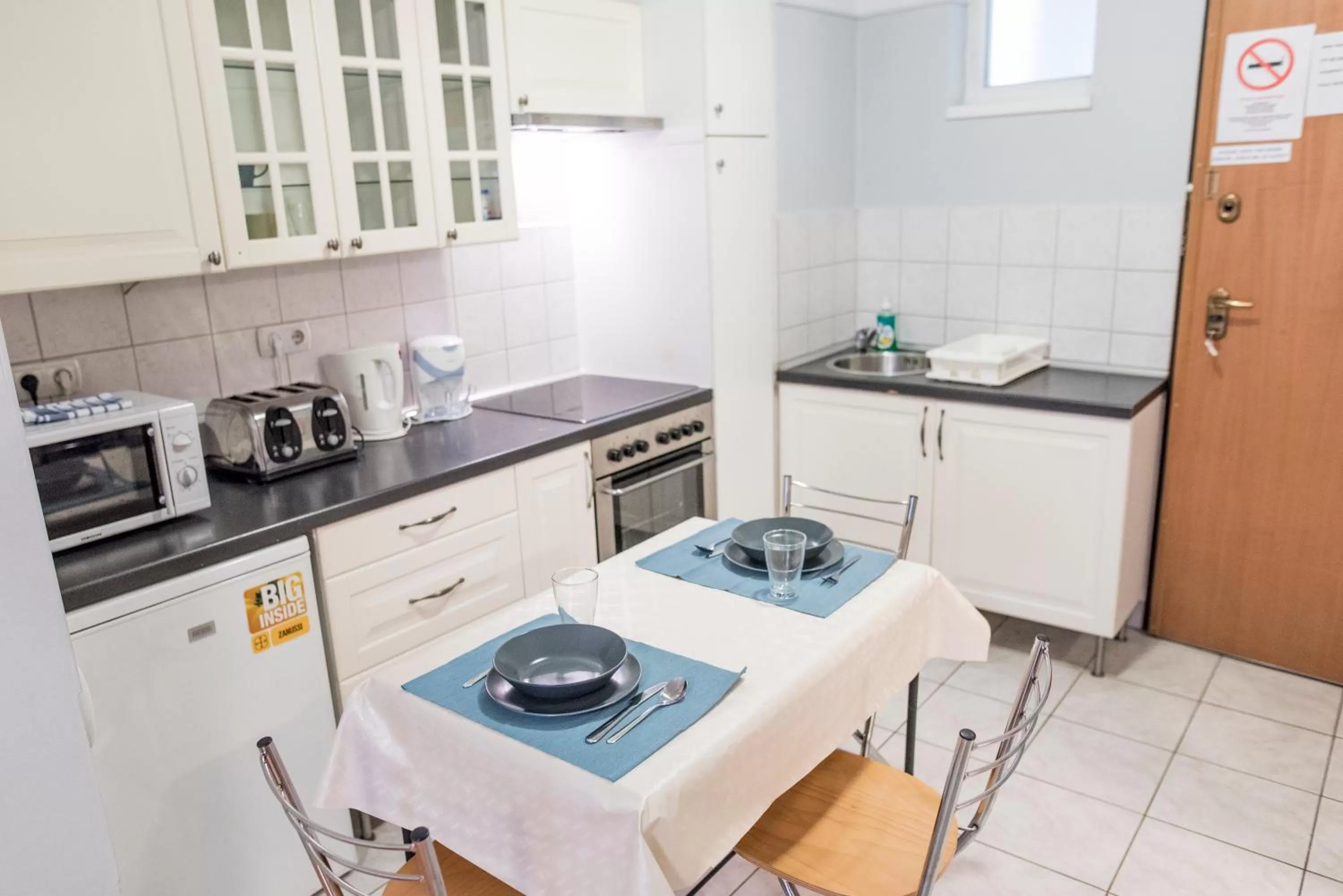 Kitchen or kitchenette in Agape Apartments