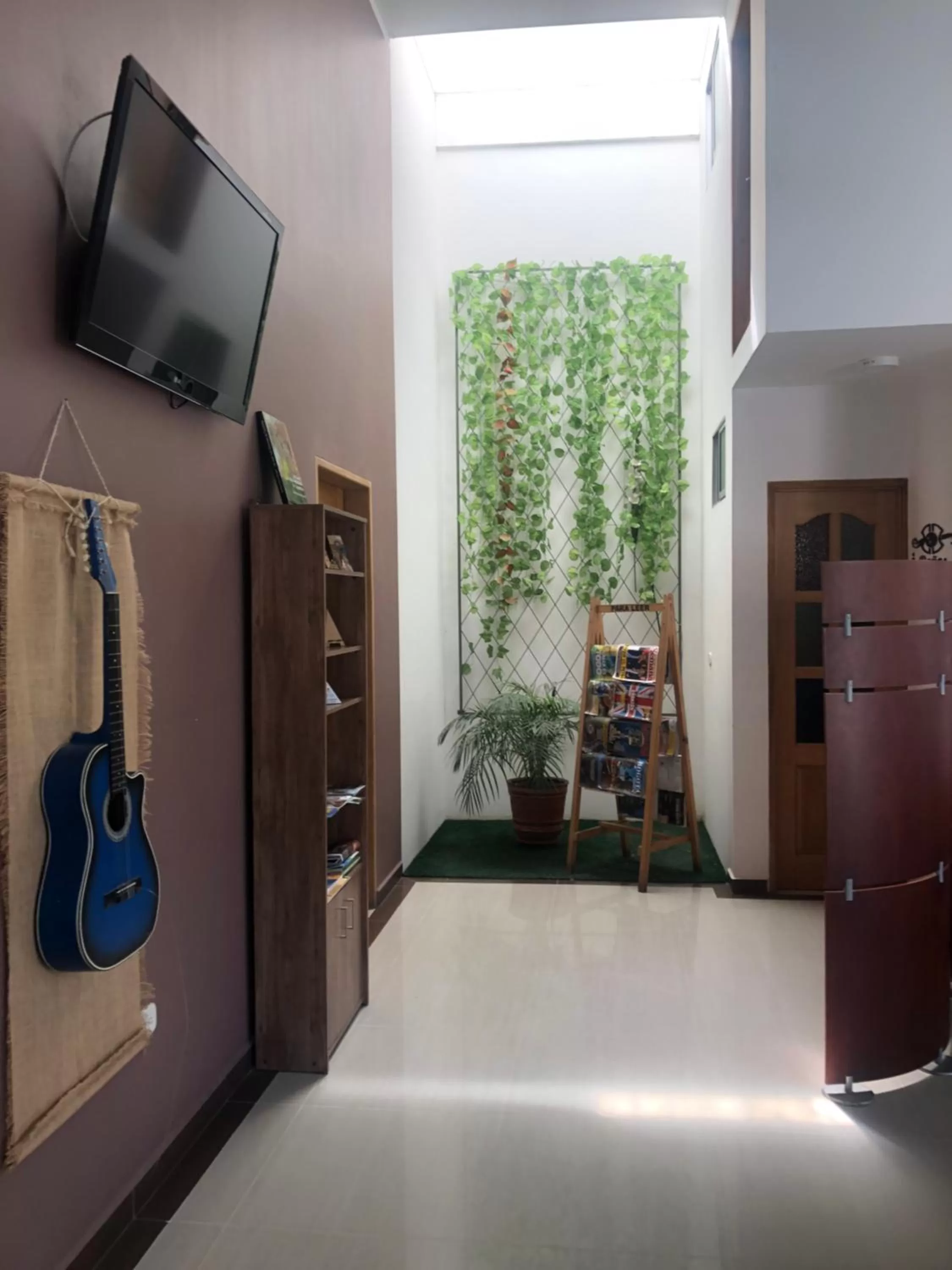 Communal lounge/ TV room, TV/Entertainment Center in Hotel Villa Colonia