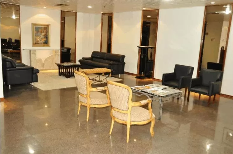 Communal lounge/ TV room, Dining Area in Cardum Hotel