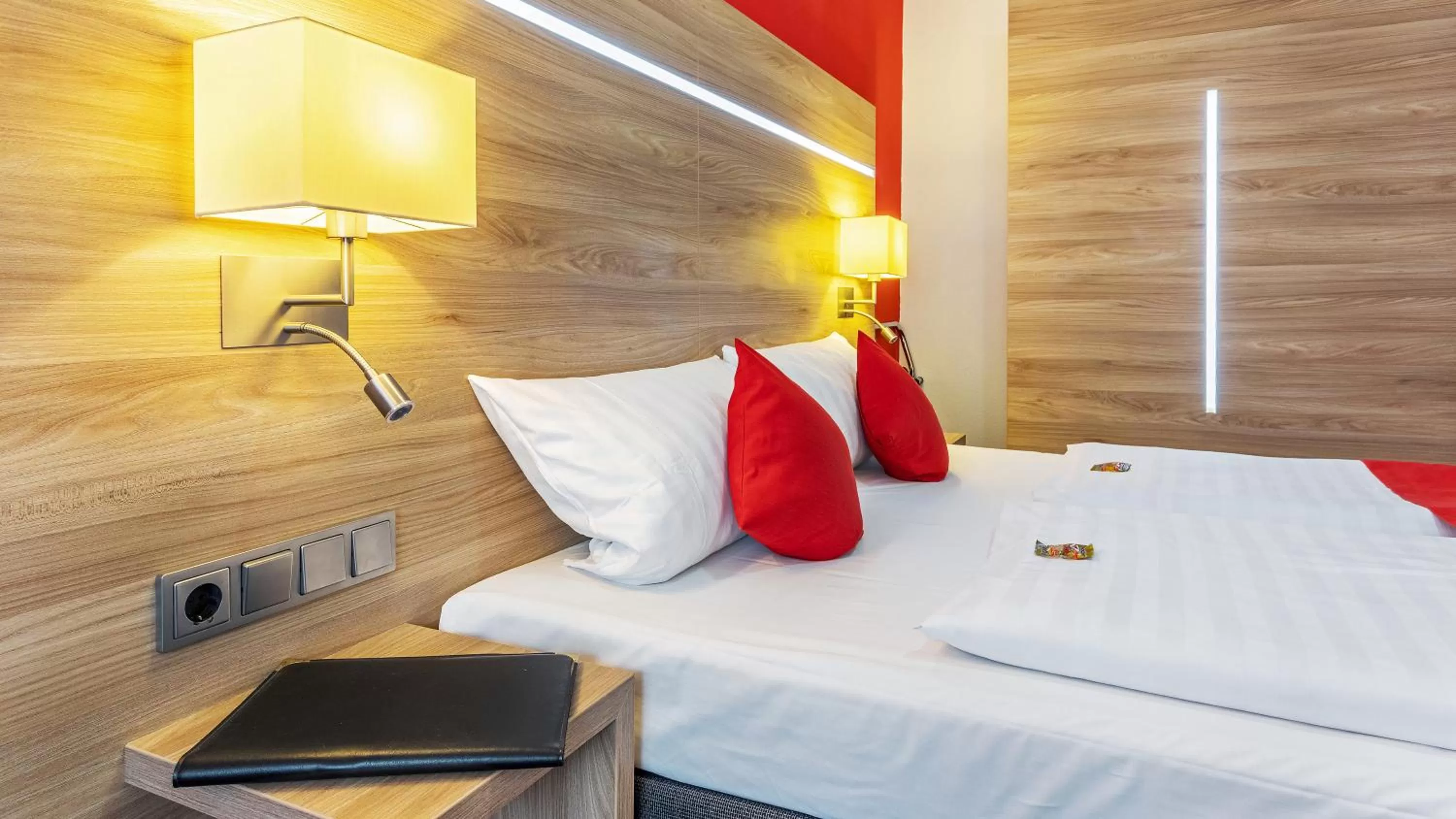 Bed in NP Hotel Wallis