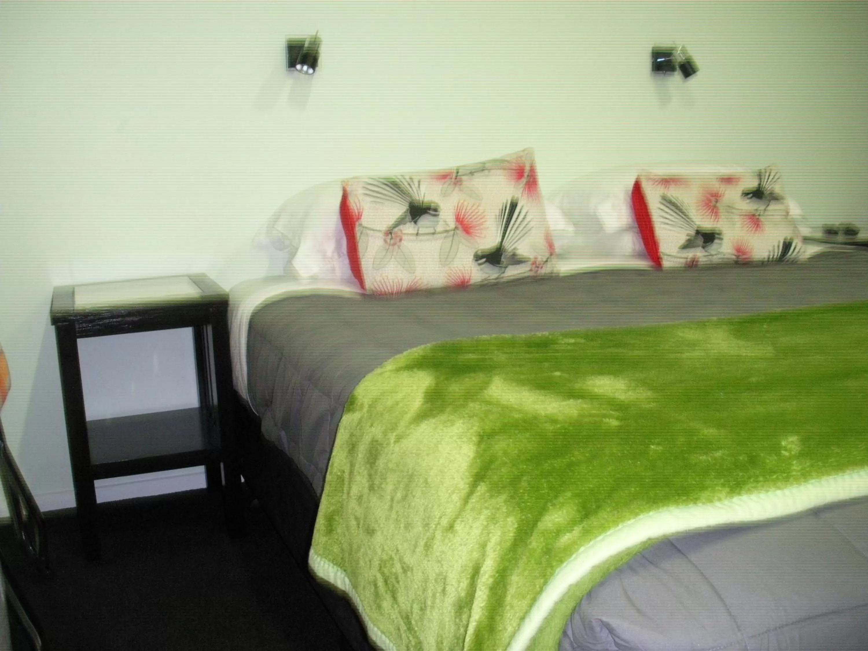 Bed in Mahinapua Retreat B&B