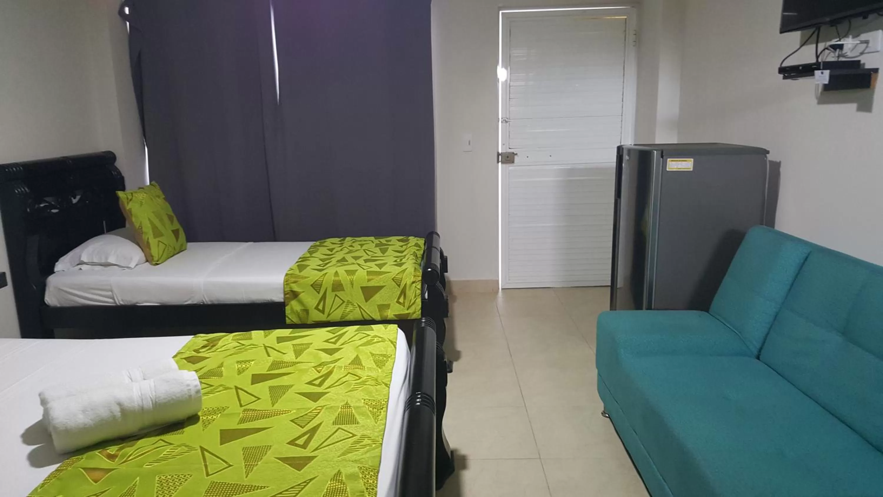 Bed in Caribbean Island Hotel Piso 2