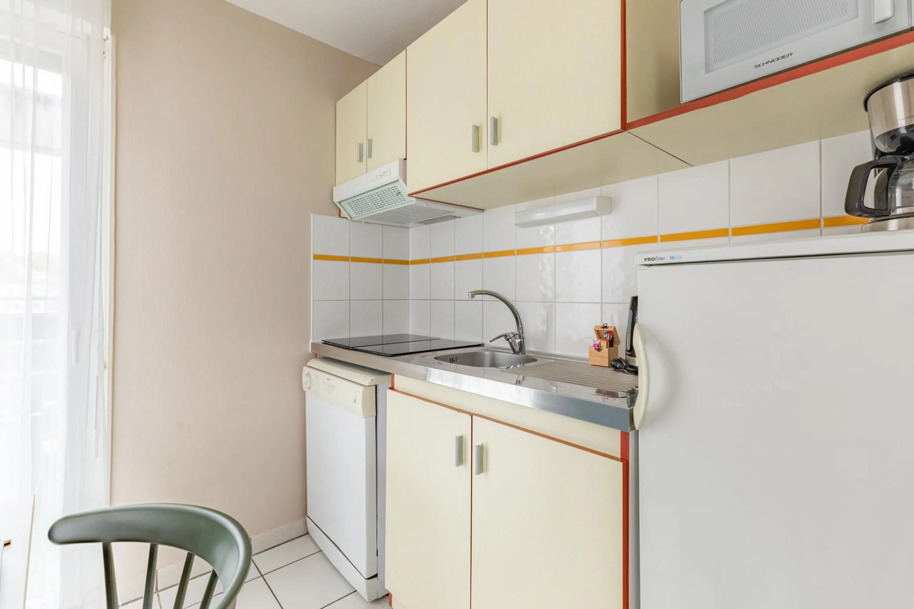 Kitchen or kitchenette in Appart'City Classic Limoges