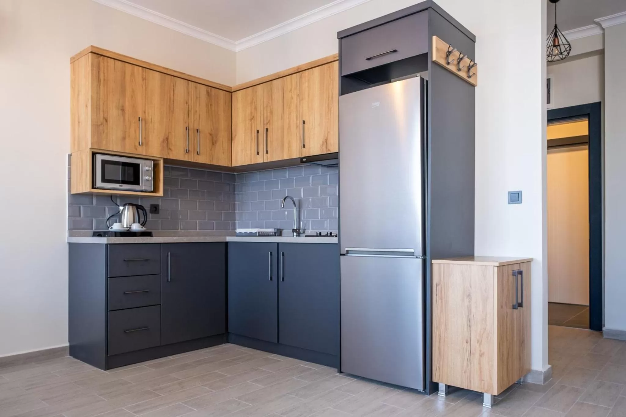 Kitchen or kitchenette in Nas Suite
