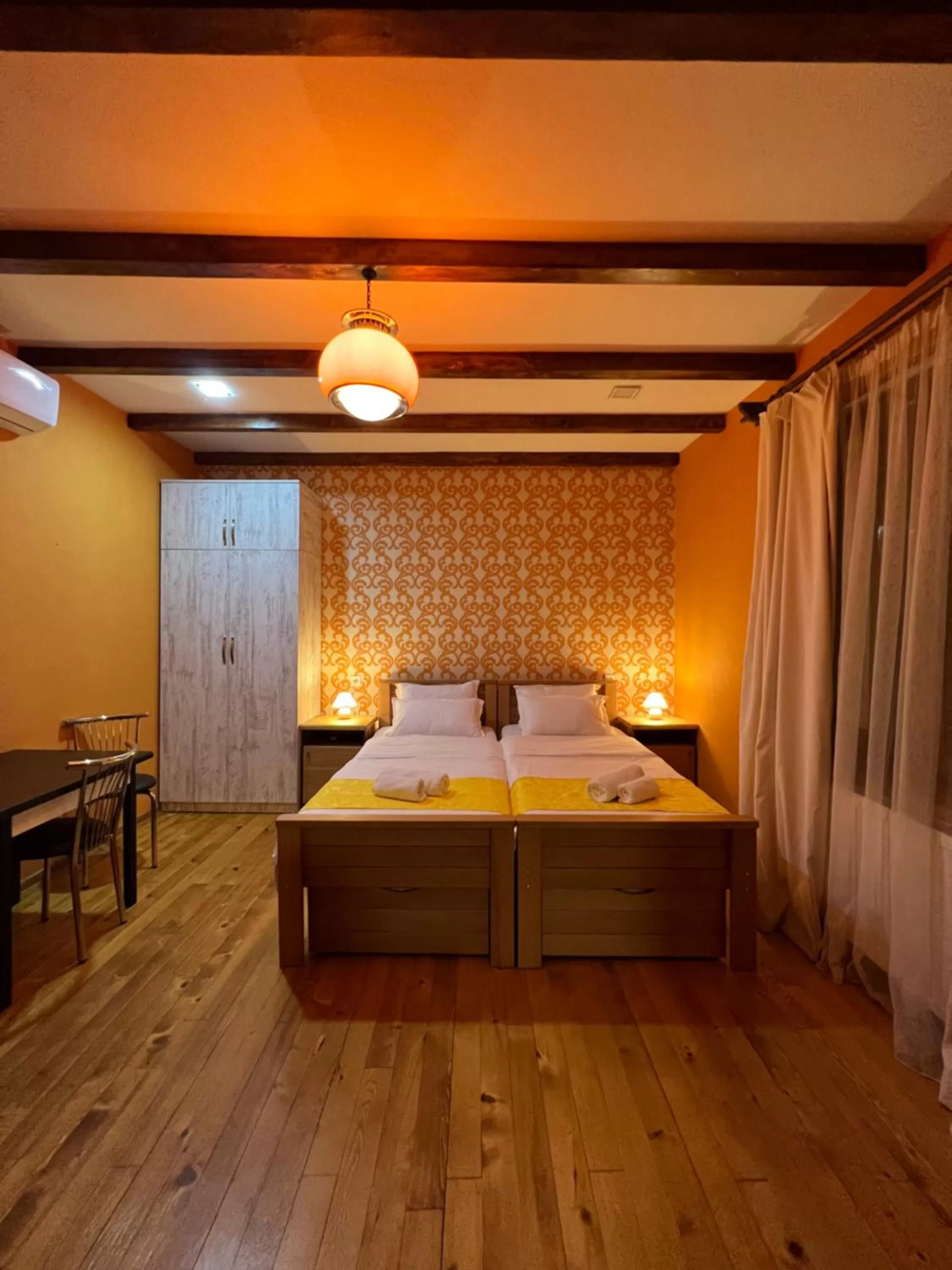 Bed in Borjomi Yellow Hotel