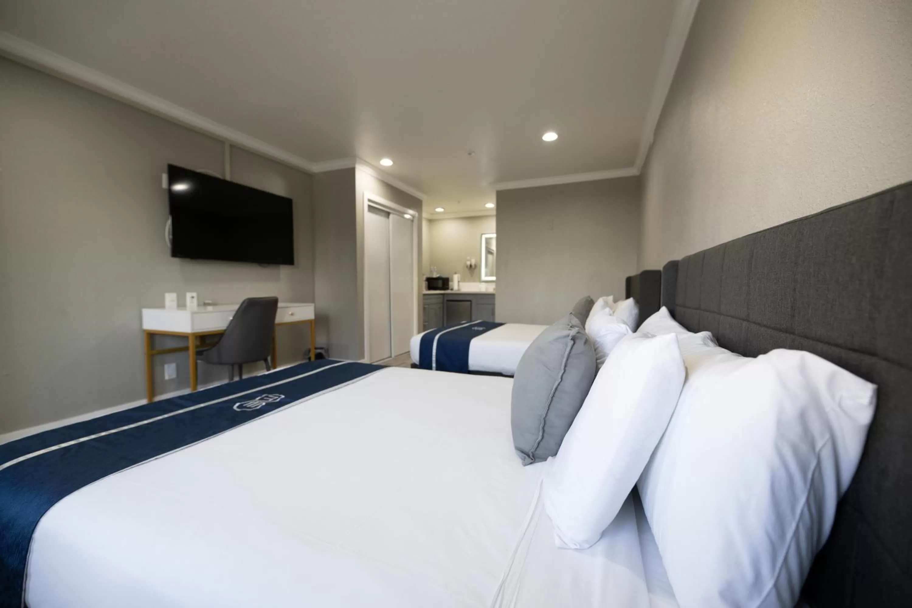 Bed in Omeo Suites