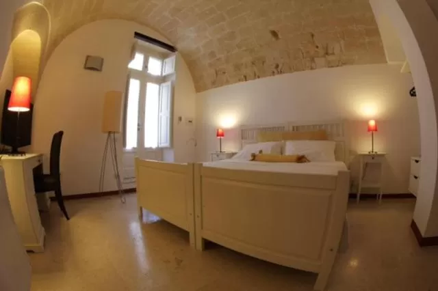 Bed in Le Malve Cave Retreat
