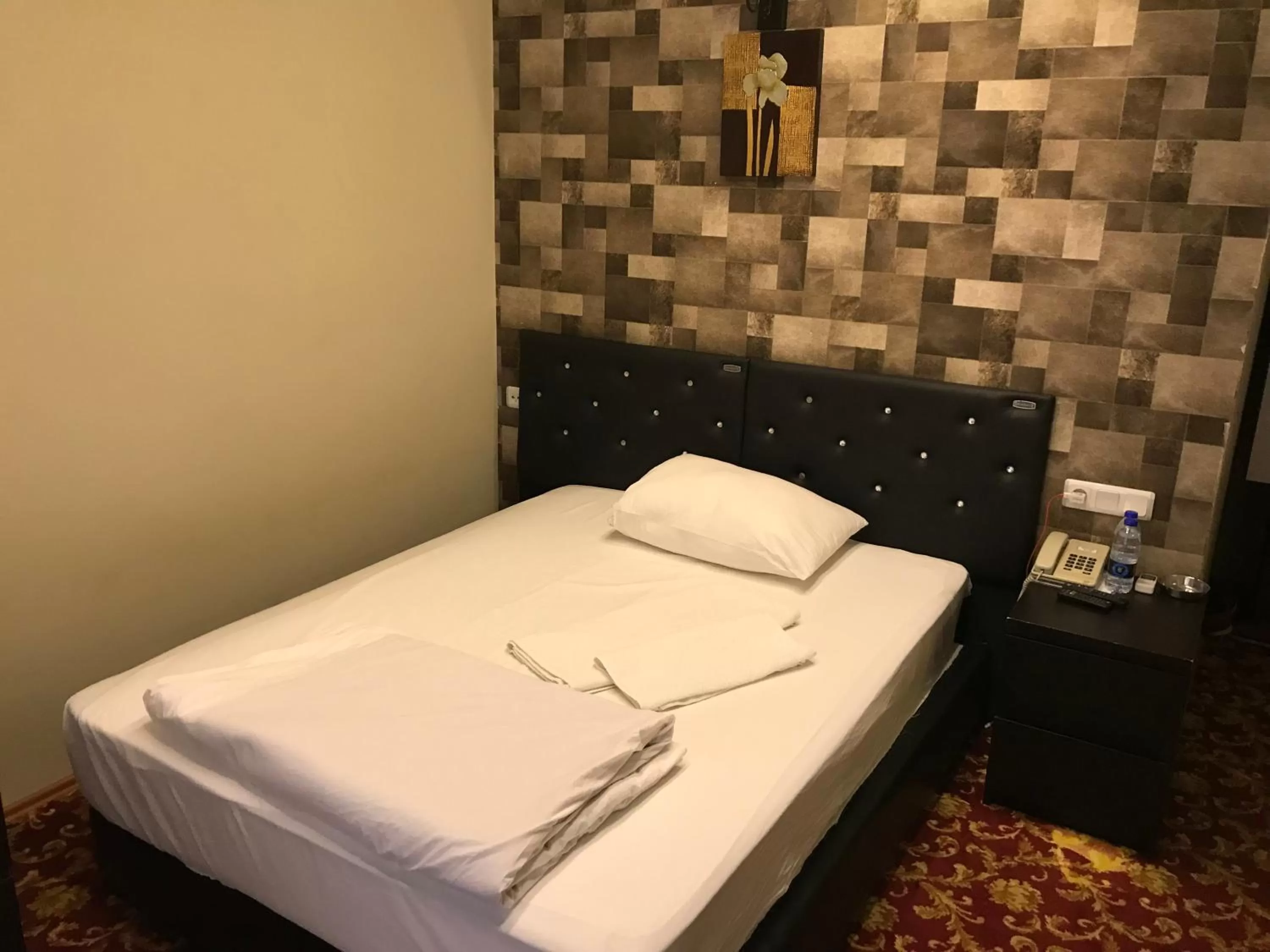 Bed in Sakran Hotel