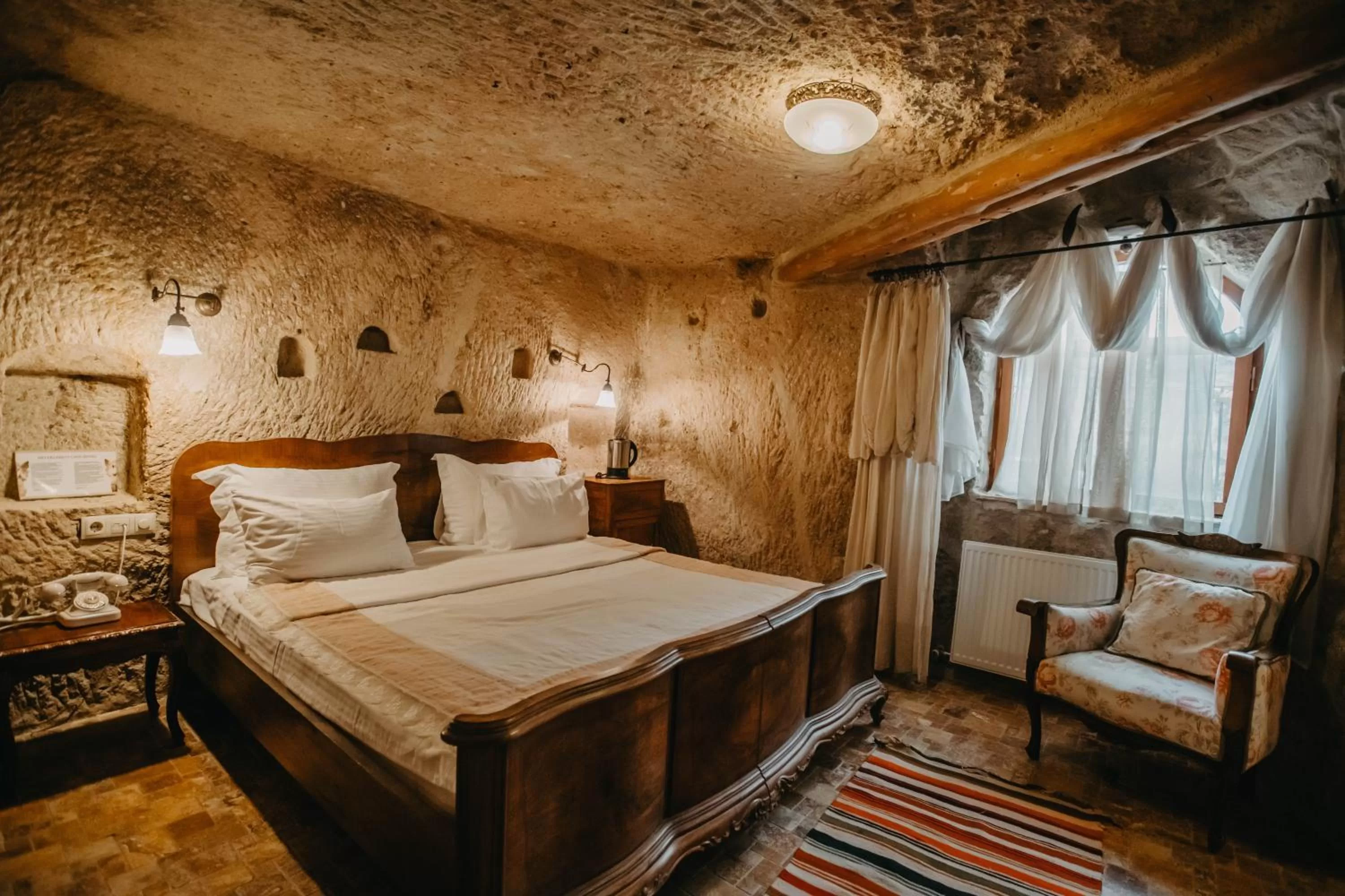 Bed in Melekler Evi Cave Hotel