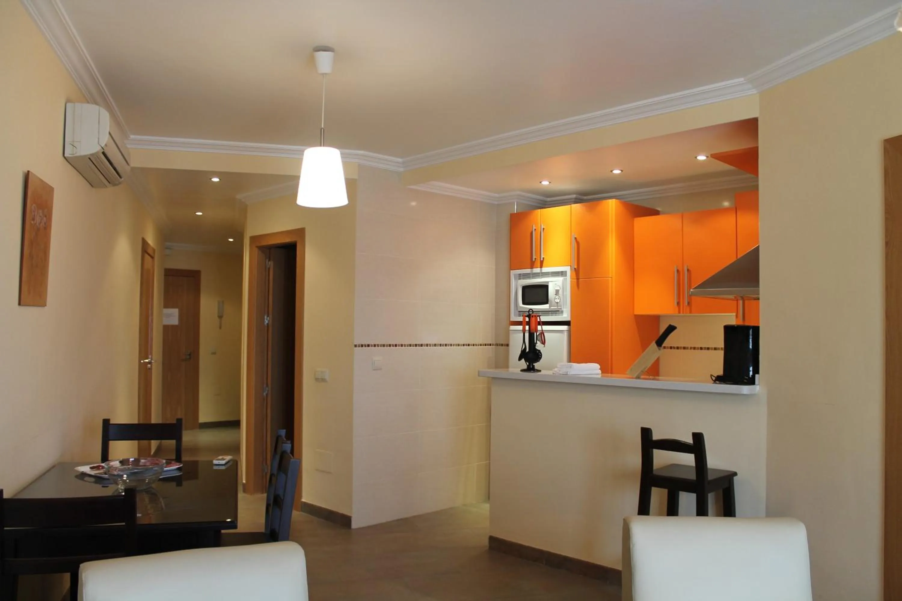 Kitchen or kitchenette in Apartamentos Turísticos Plaza del Olvido