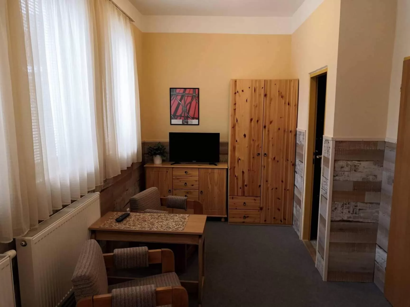 Photo of the whole room, TV/Entertainment Center in Hotel Alfa