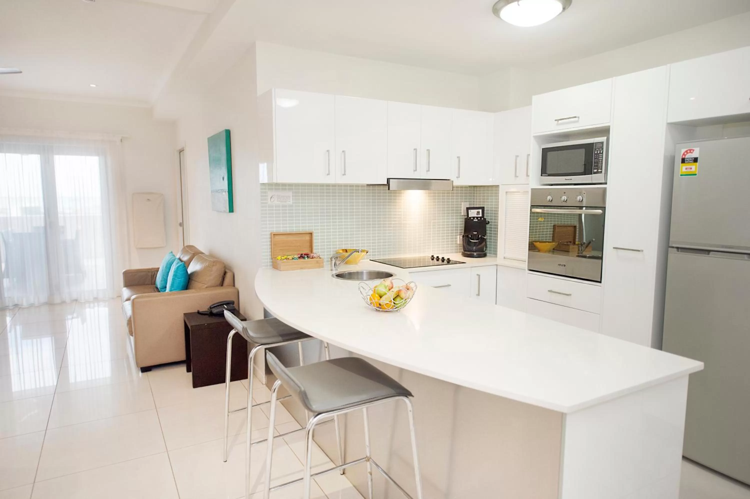 Kitchen or kitchenette in Gladstone City Central Apartment Hotel Official