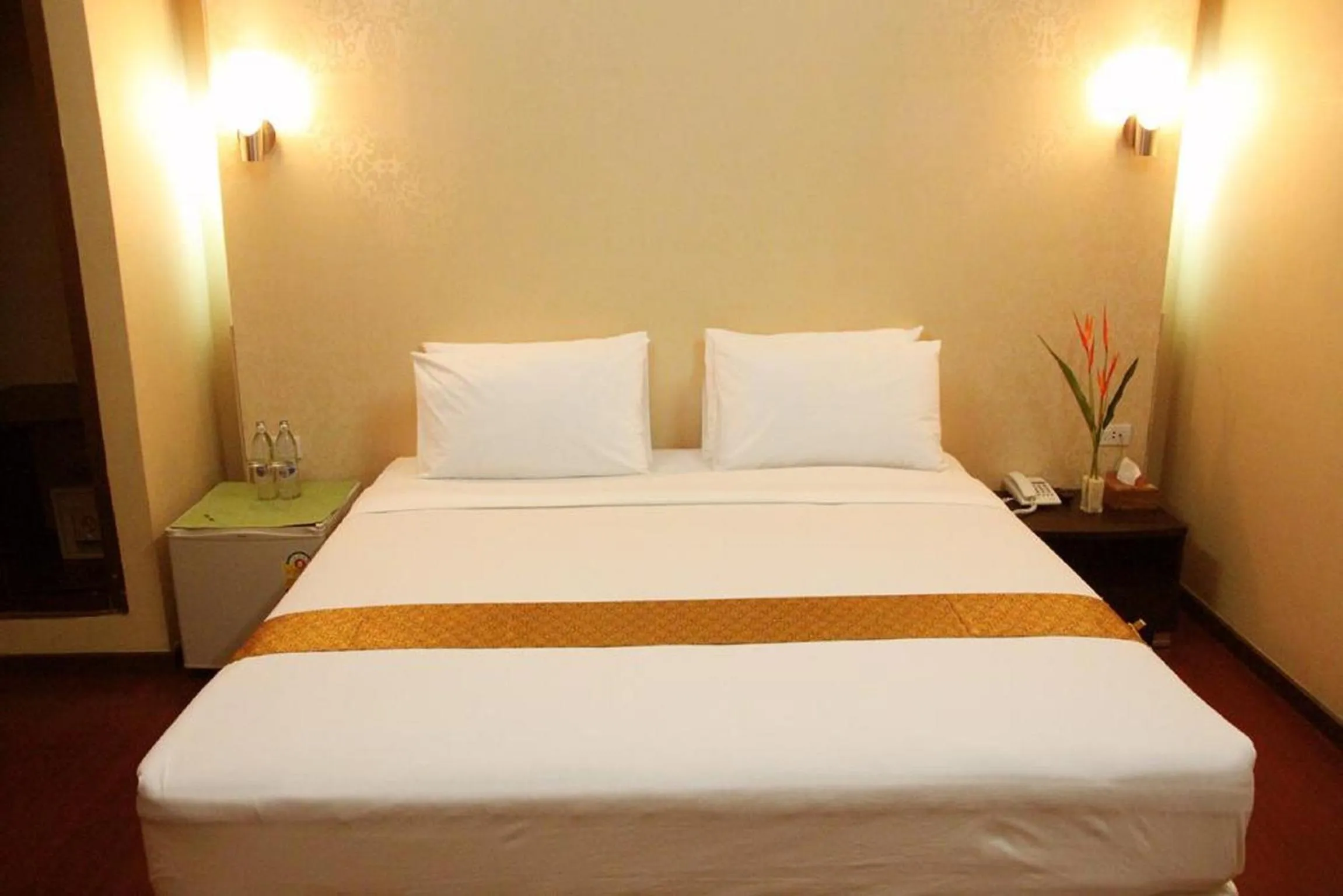 Bed in Visiting Card Hotel & Resort