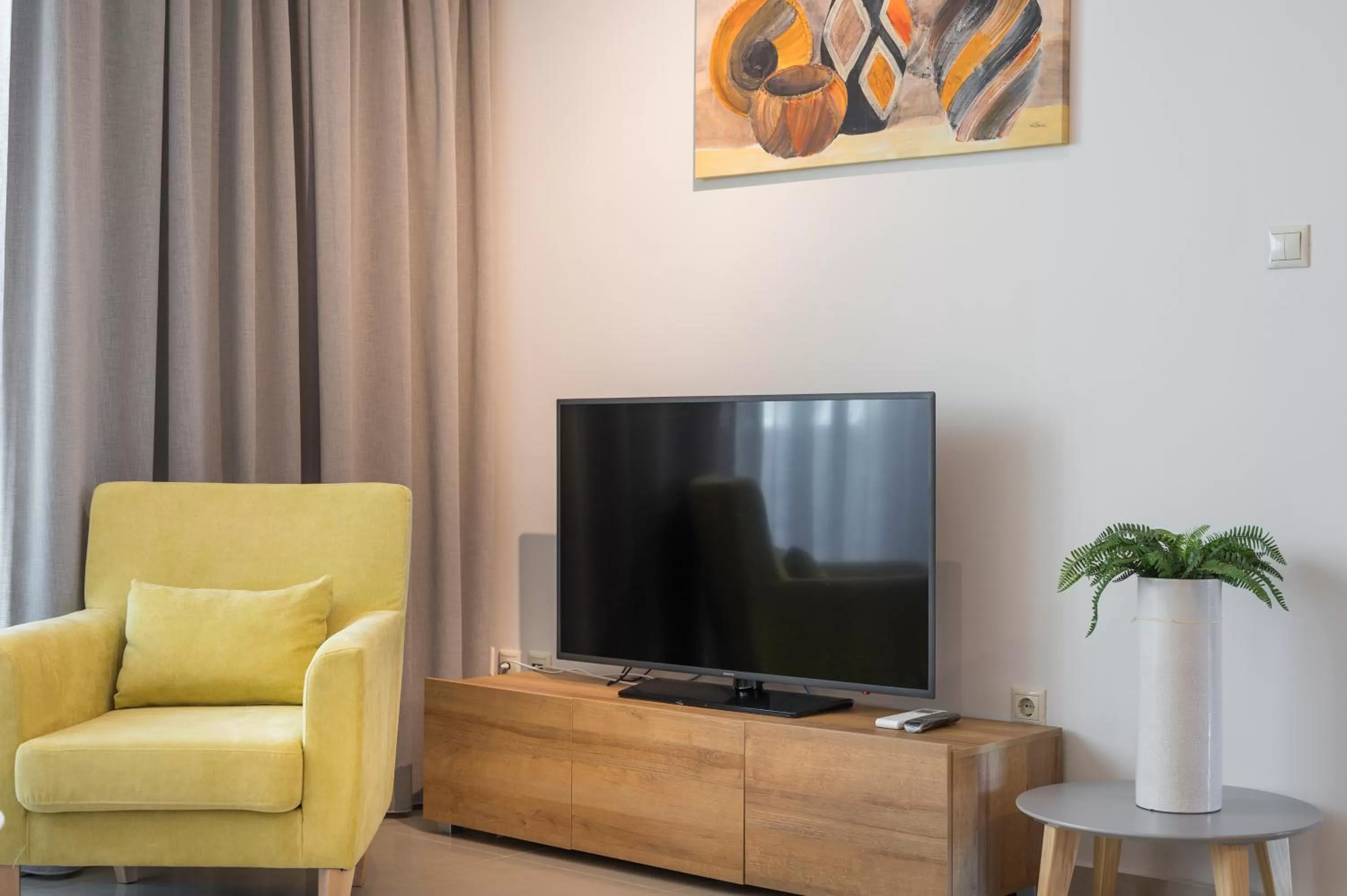 TV and multimedia in Trianon Luxury Apartments & Suites