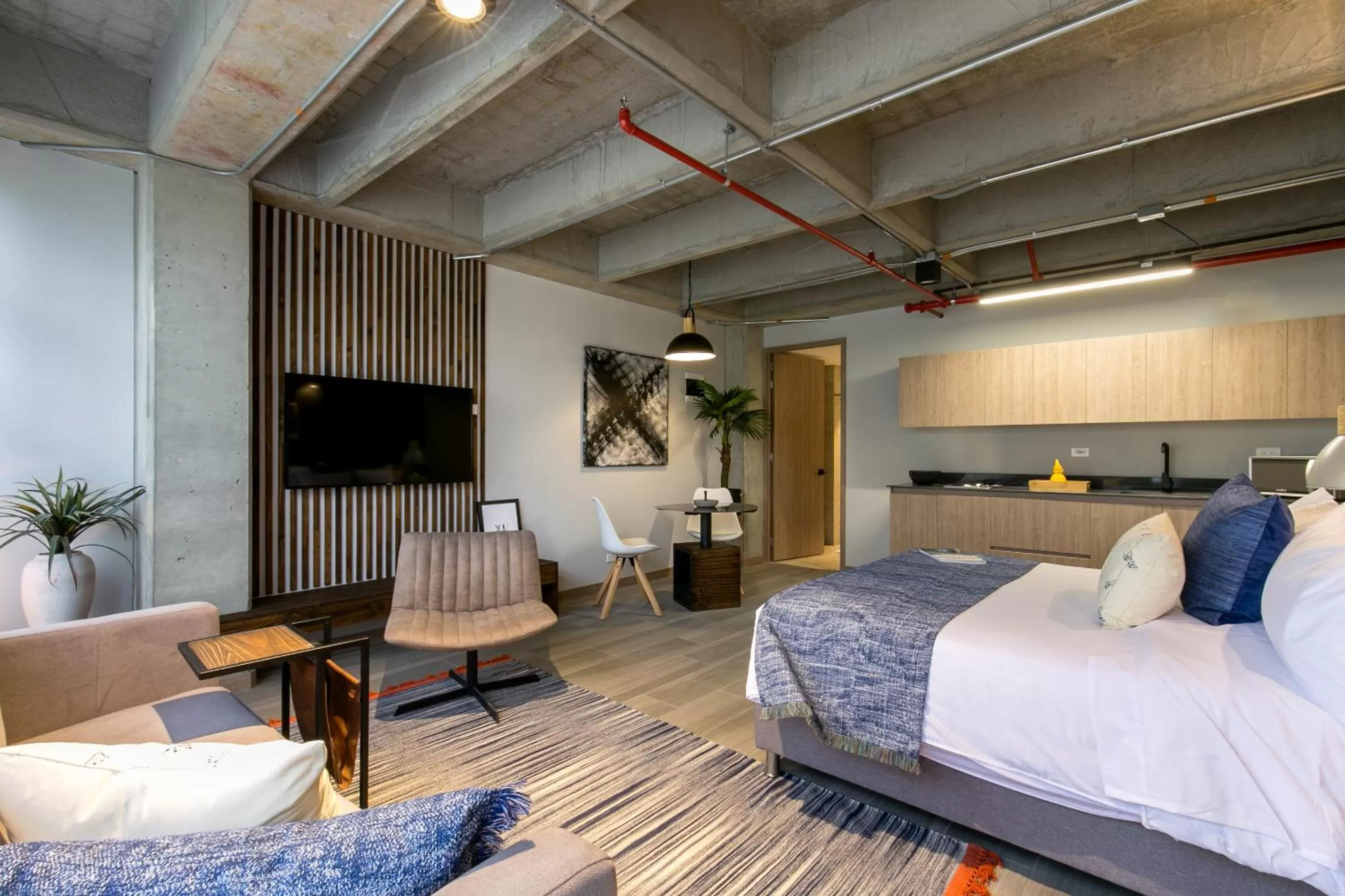 Bed in Factory Lofts Hotel