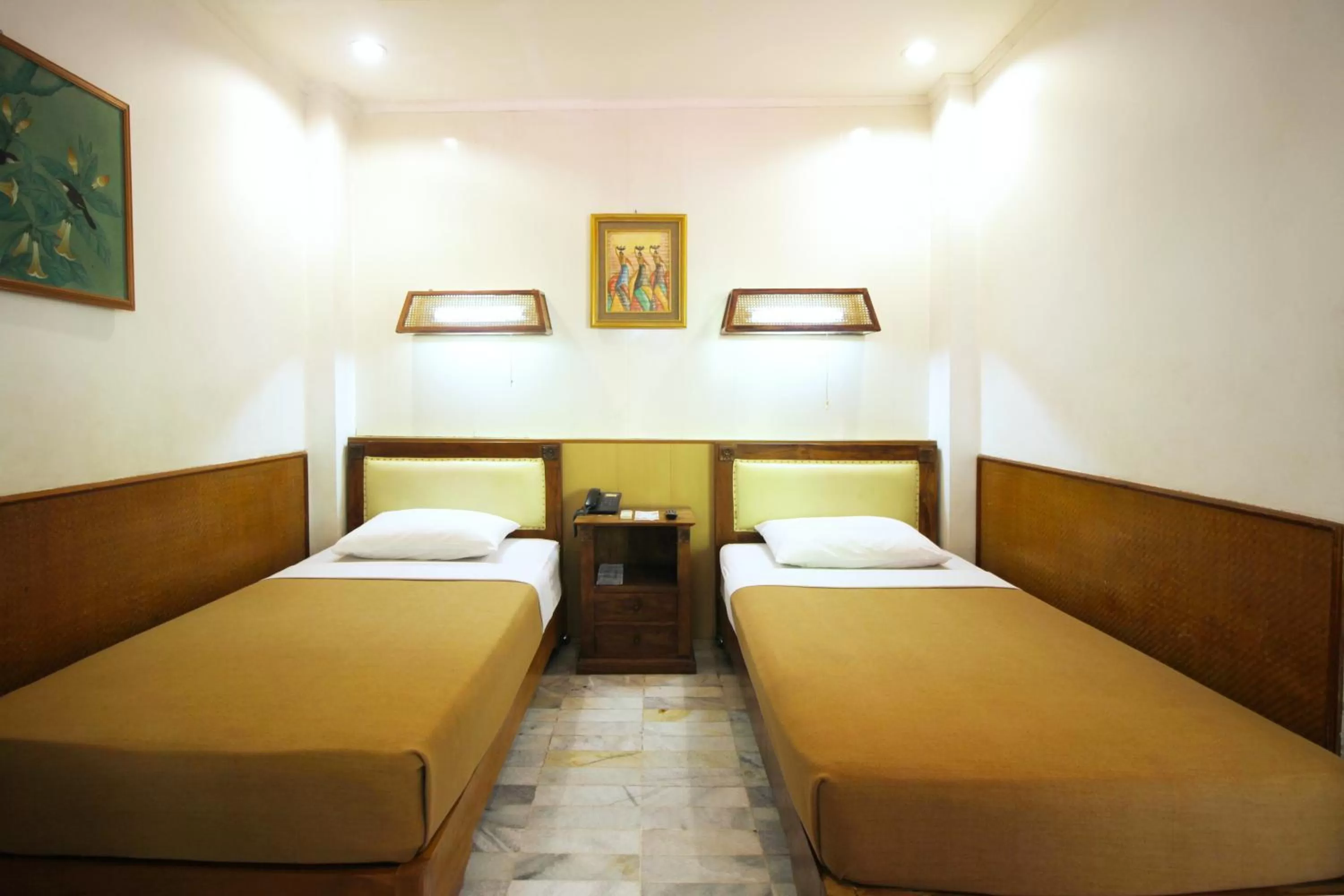 Bed in Hotel Karthi Kuta
