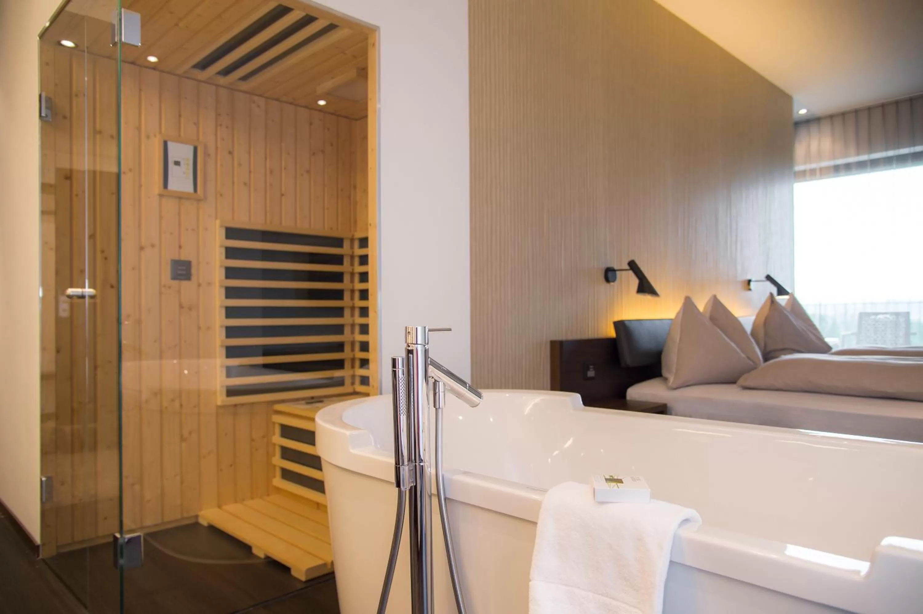 Photo of the whole room, Bed in Wellnesshotel Golfpanorama