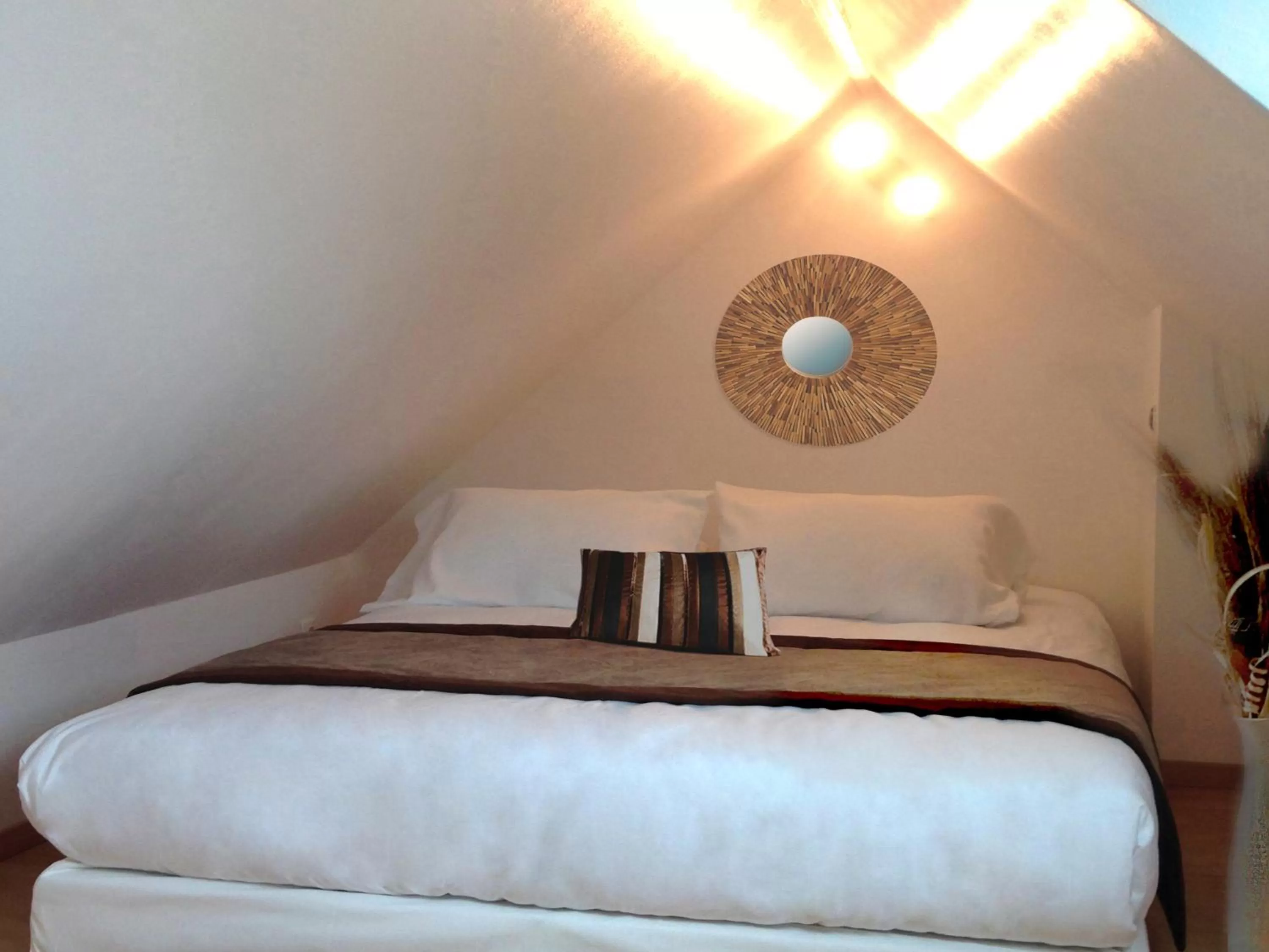 Bed in APPART'HOTEL61 Comme à la maison au Cœur de la Normandie