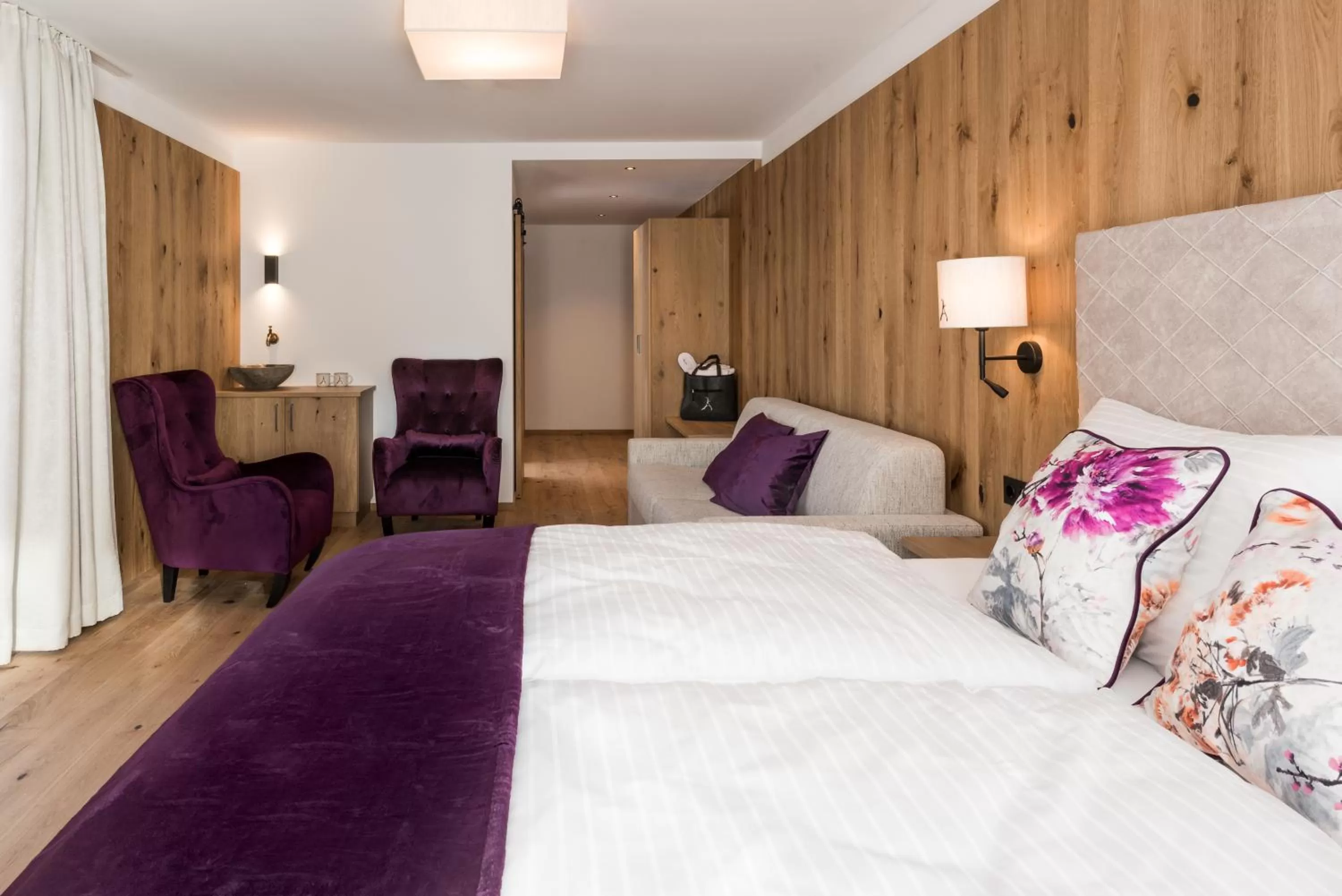 Bed in Boutiquehotel die Alpbacherin 4 Sterne Superior