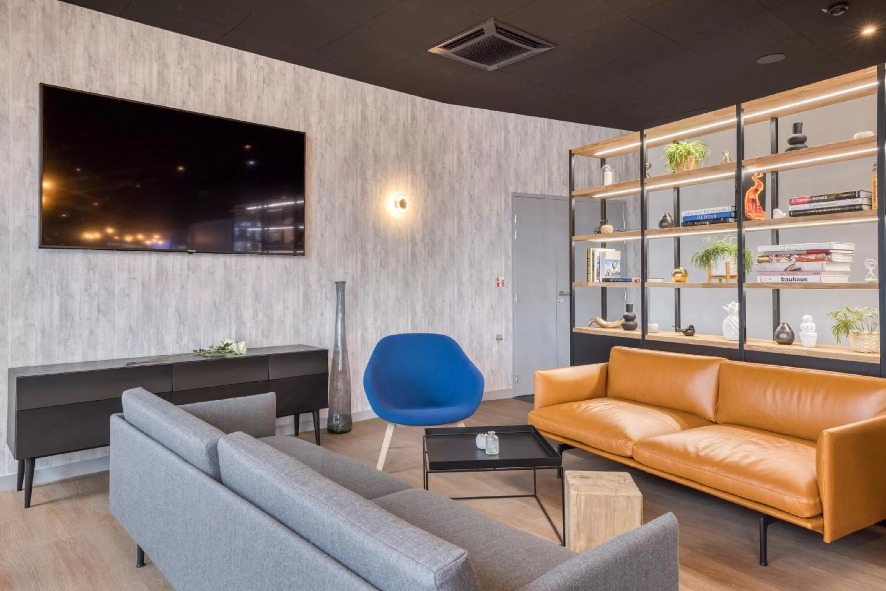 Communal lounge/ TV room in Campanile Rennes Sud - Saint Jacques