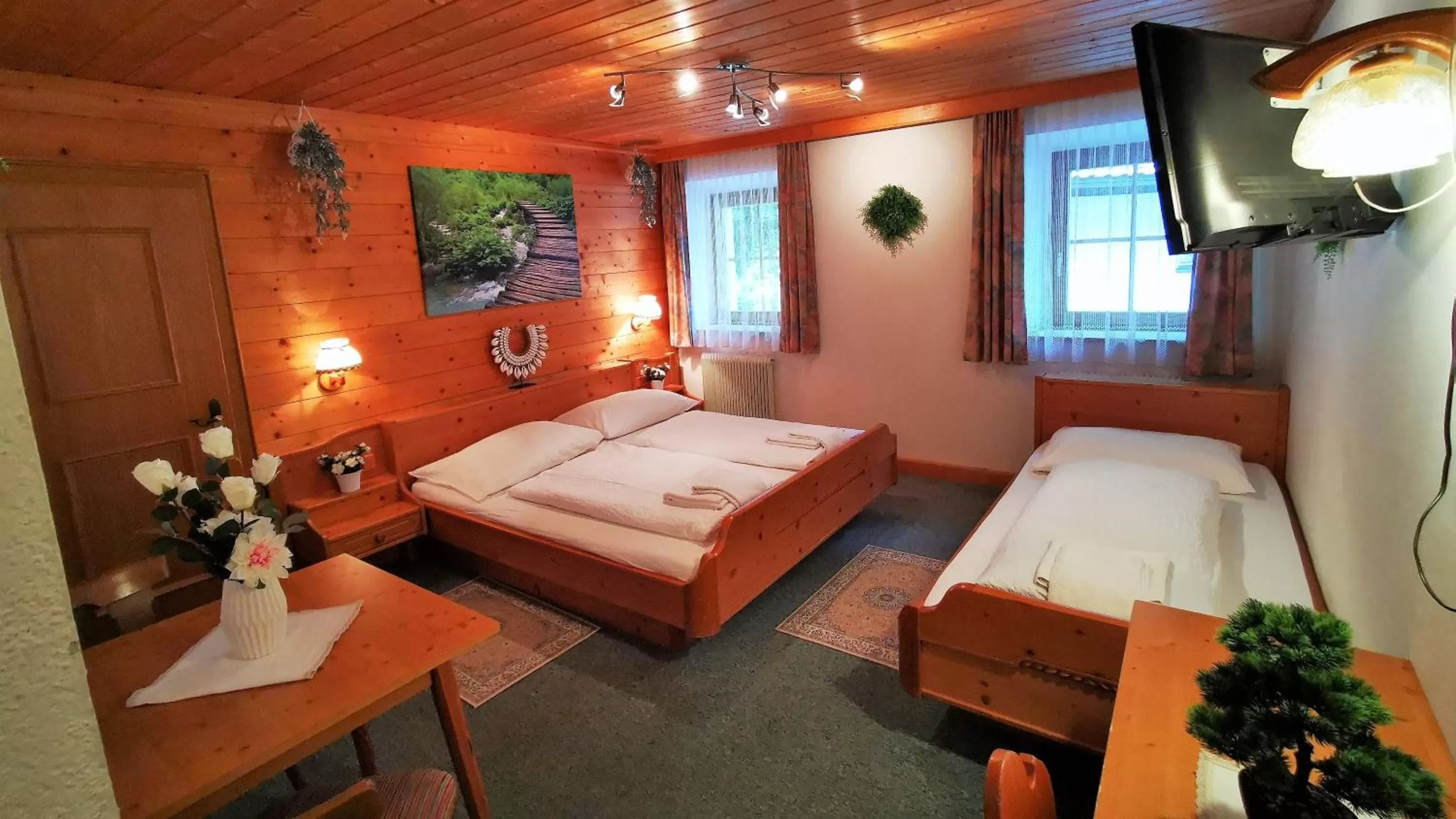 Photo of the whole room, Bed in Gasthof Geronimo