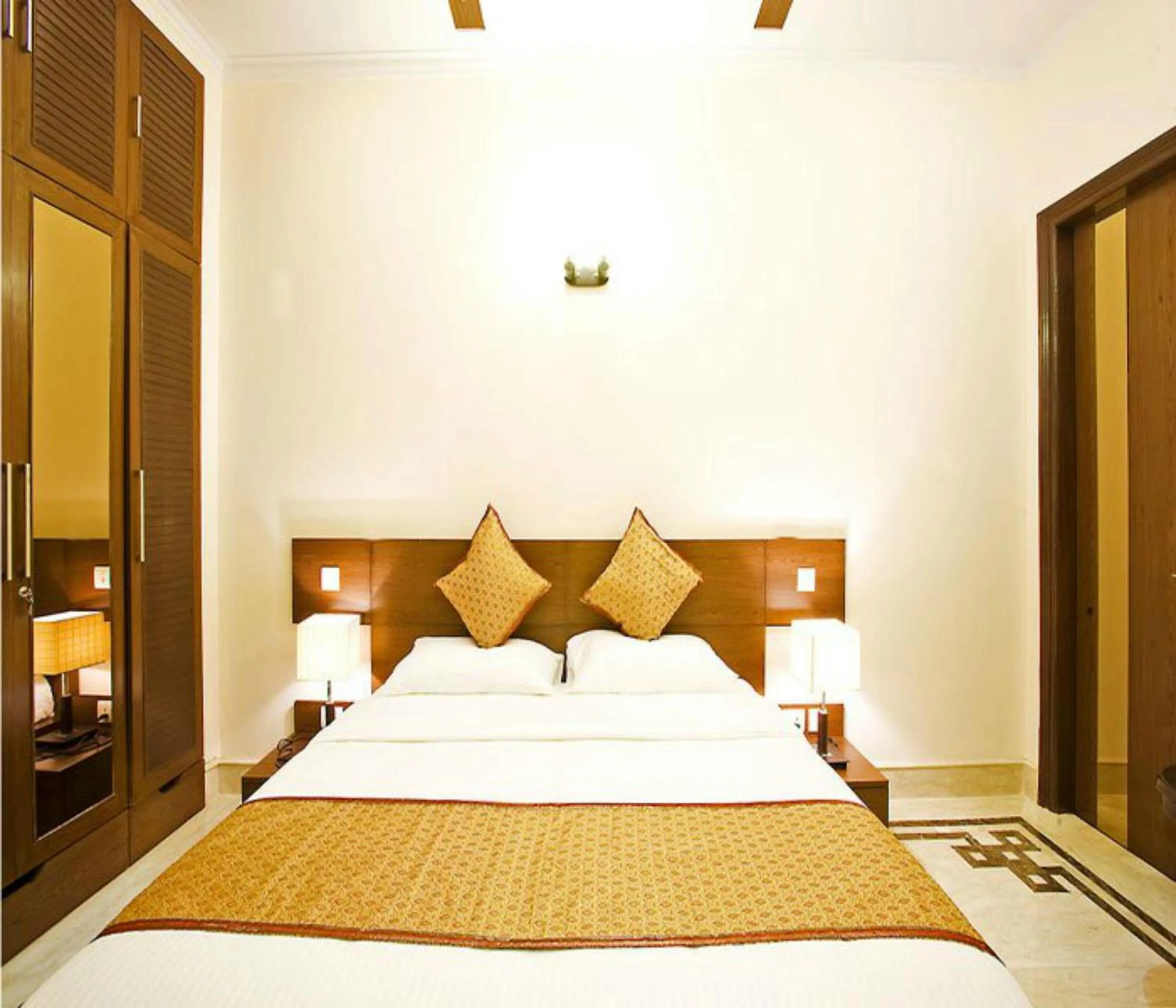 Bed in Evergreen Suites