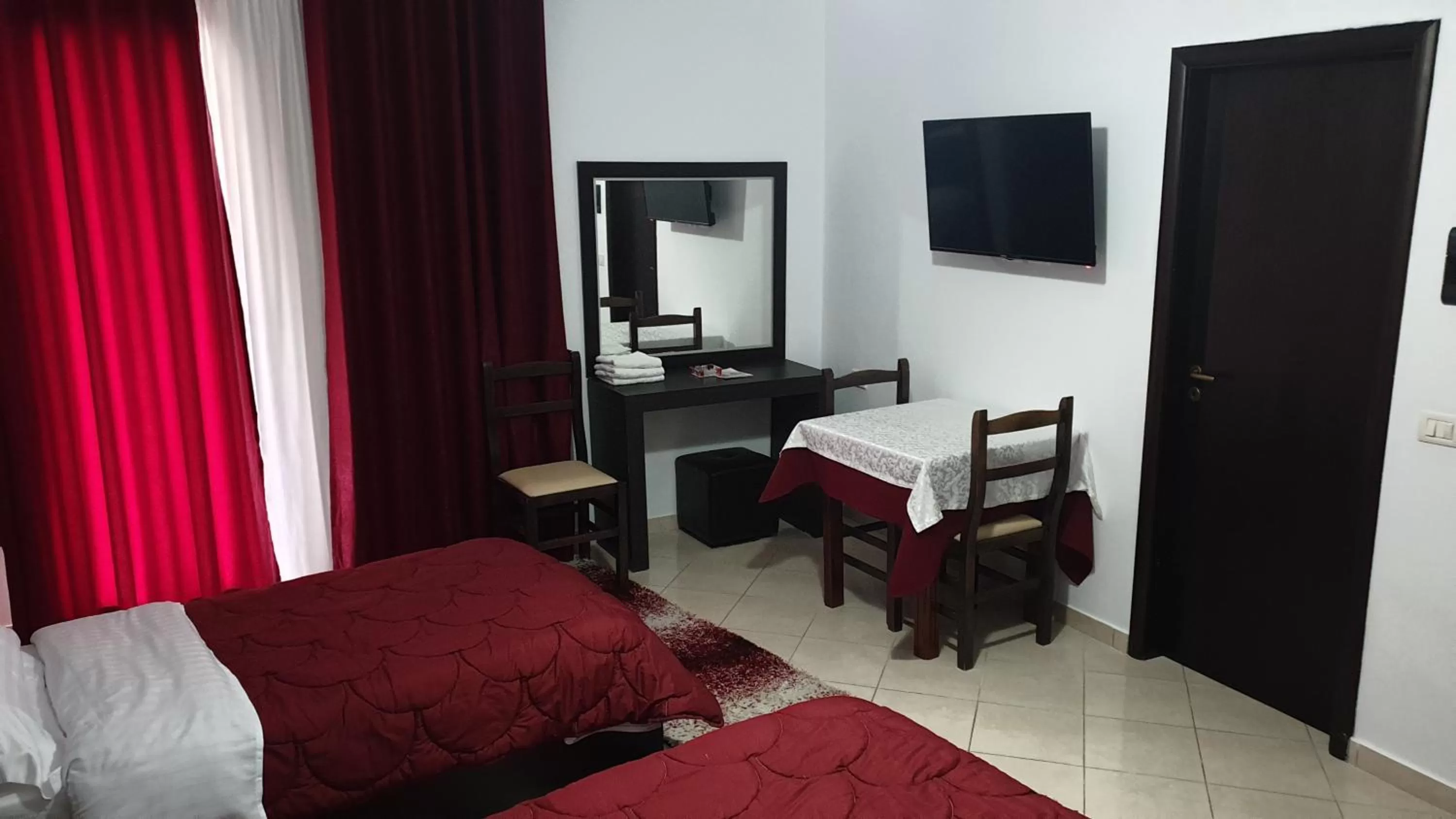 TV/Entertainment Center in Haris Hotel