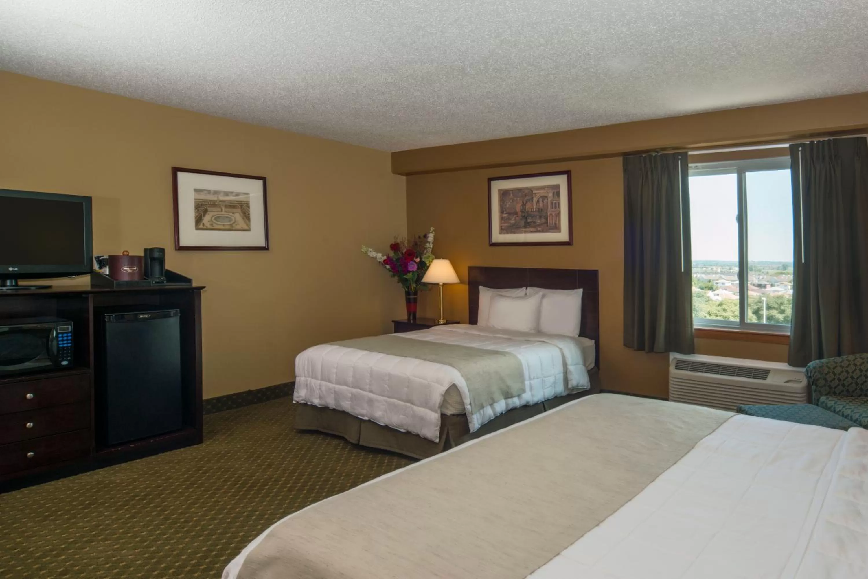 Bed in Meadowlands Plaza Hotel