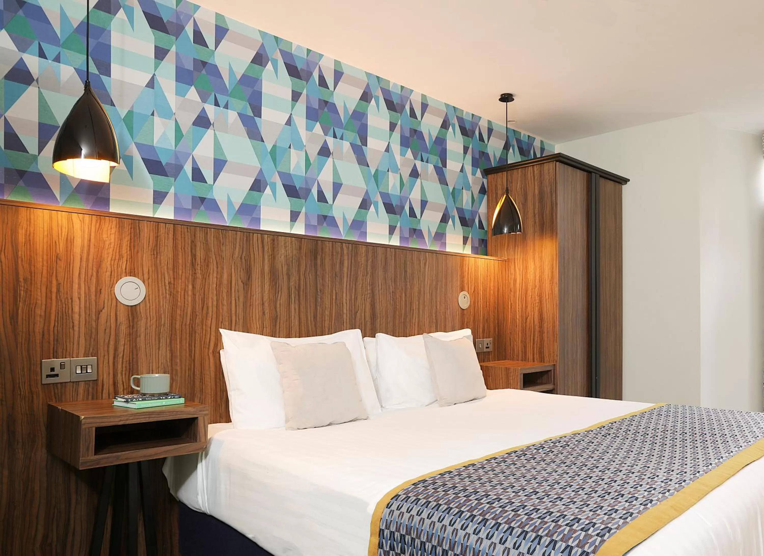 Bed in Cairn Hotel & Apartments