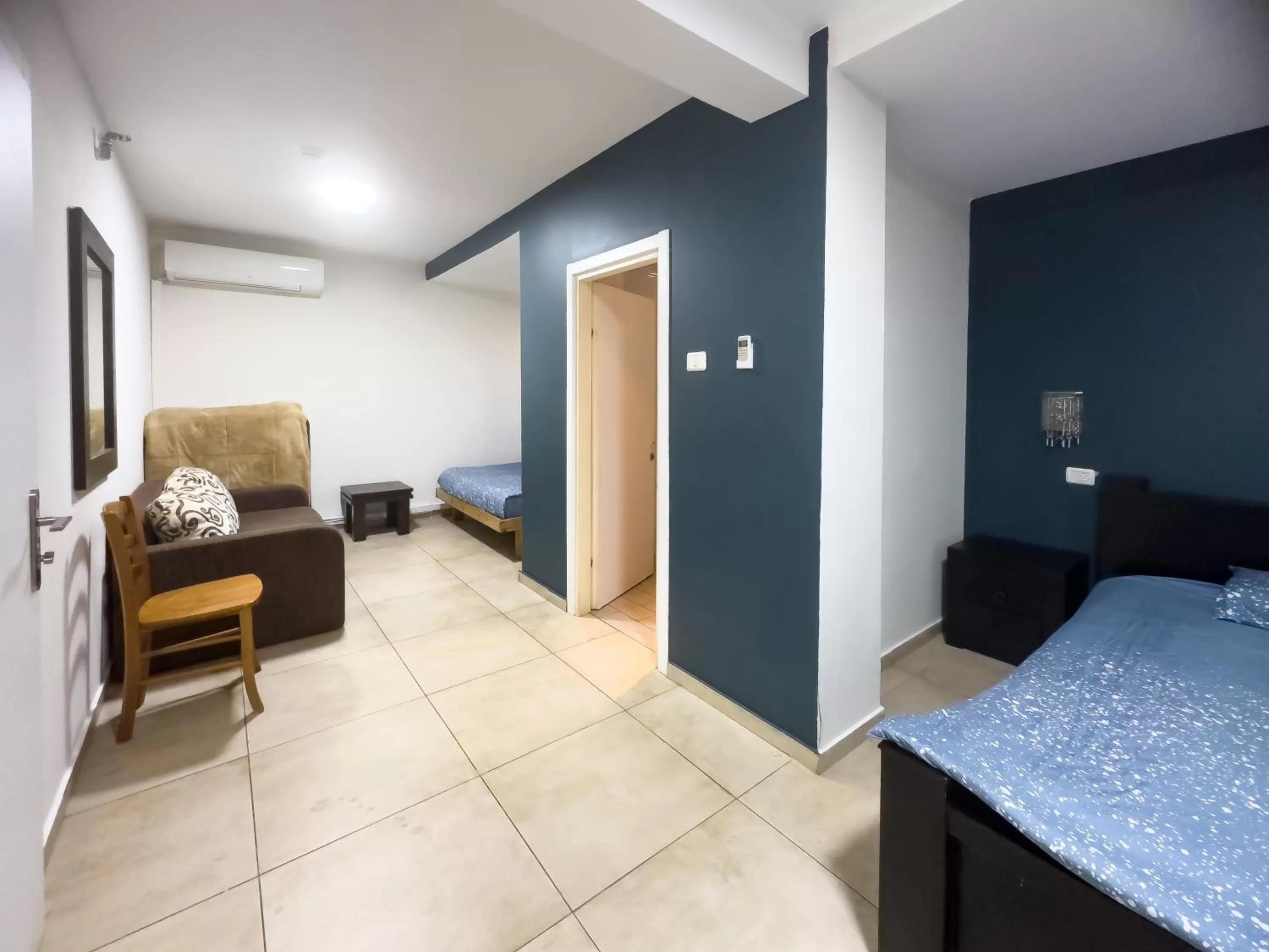 Bed in Central Laguardia Hotel